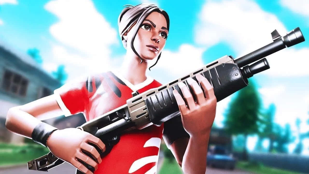Sweaty Soccer Skin 桌布 壁紙 — 一個穿著紅色襯衫的女性Fortnite角色，在明亮的藍天下，手持黑色突擊步槍，背景是模糊的郊區建築。