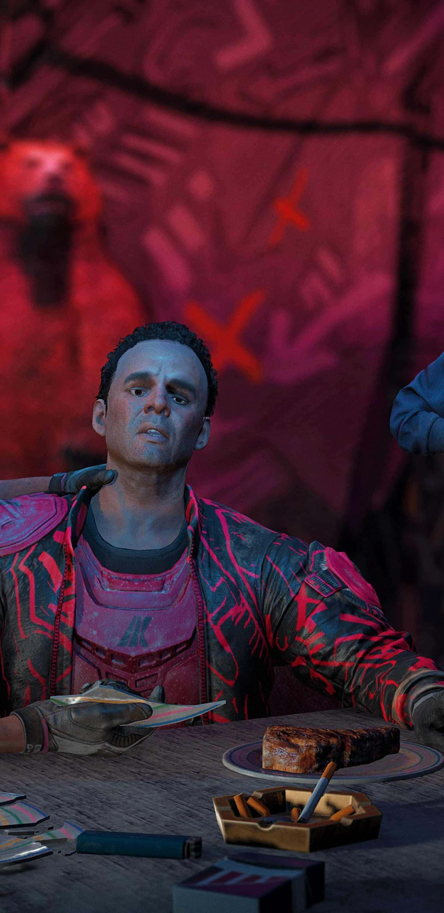 Android Far Cry New Dawn 桌布 壁紙 — 一個穿著紅黑裝甲外套的男人坐在一張有牛排和煙灰缸的桌子旁，燈光昏暗的紅色燈光下。