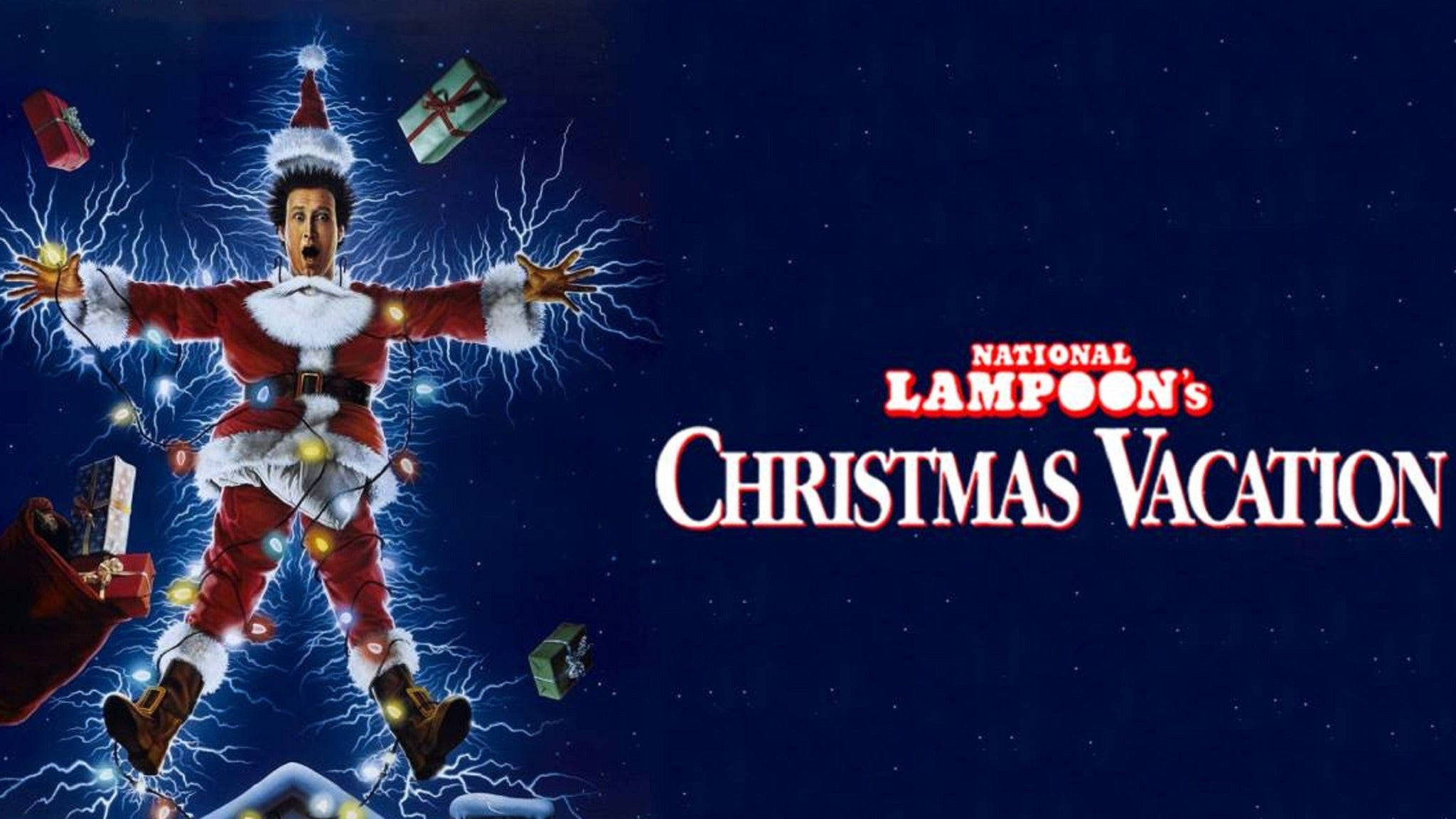 Christmas Vacation 桌布 壁紙 — 一個穿著聖誕老人套裝的男人在星空夜空中漂浮的禮物中被閃電擊中。