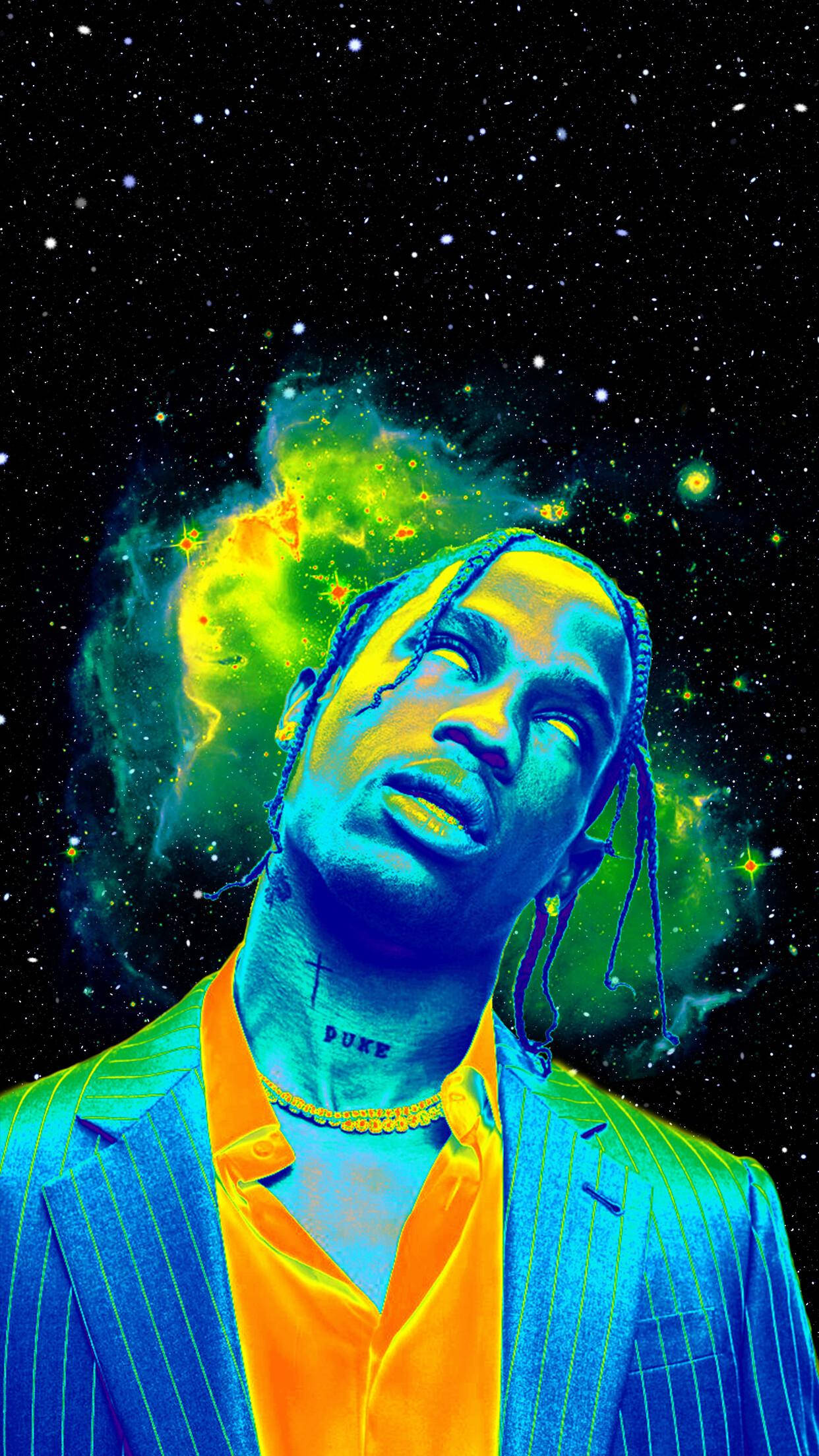 Travis Scott Astroworld 桌布 壁紙 — 一個穿著藍色西裝的男人向上凝視，頭後方有明亮的宇宙星雲在繁星點點的夜空背景下發光。