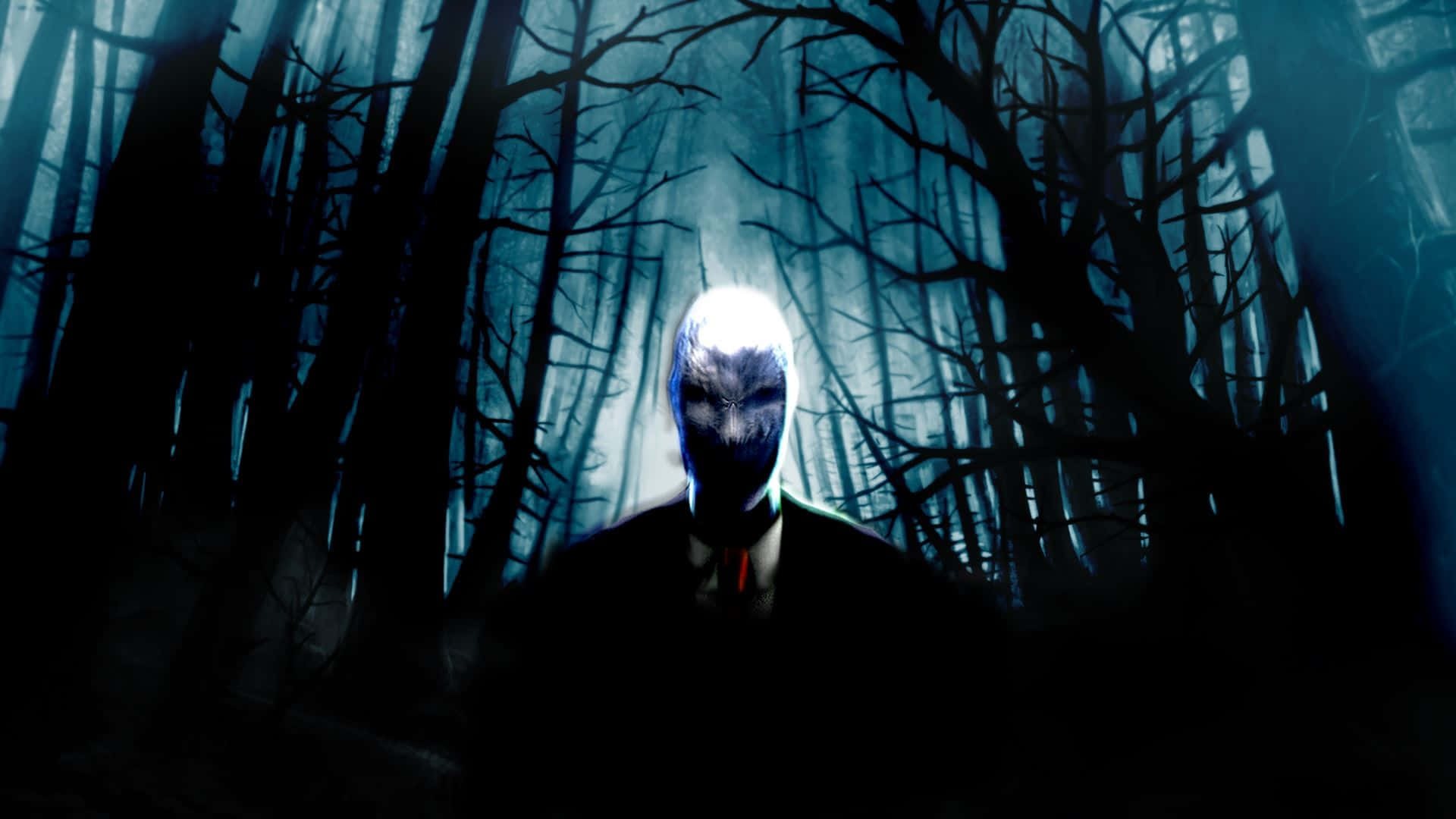 Creepypasta 桌布 壁紙 — 一個穿著西裝、臉色蒼白發光的身影，在黑暗陰森的森林中，周圍是光禿禿的扭曲樹木，威嚇地站立著。