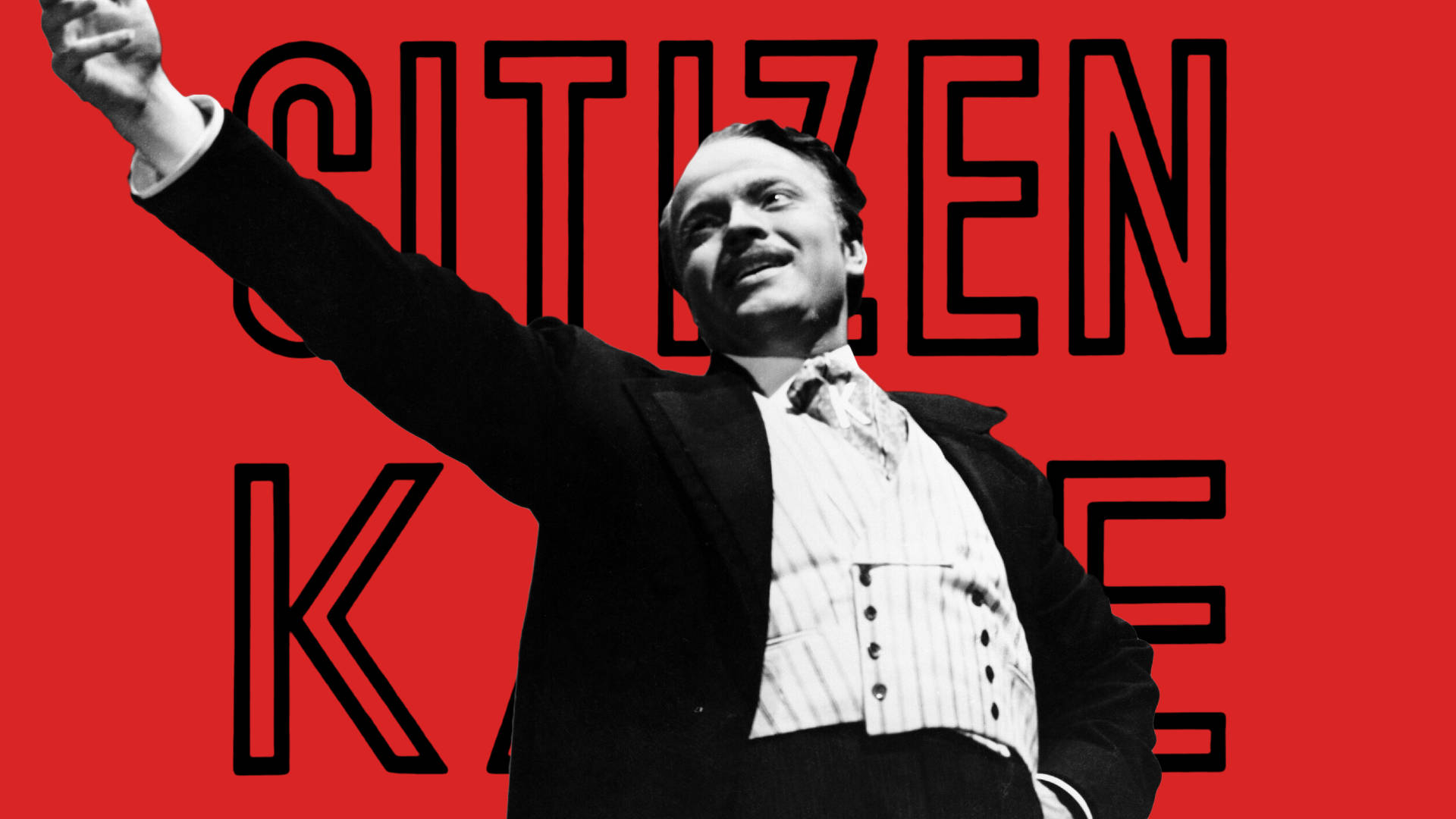Citizen Kane 桌布 壁紙 — 一個穿著西裝的男人在鮮紅色背景上舉起手臂的黑白肖像，背景上有大字寫著 'CITIZEN KANE'。