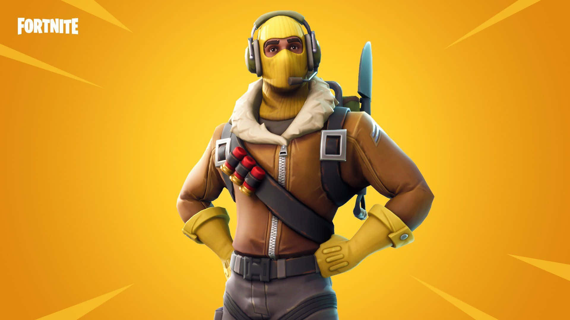 遊戲 桌布 壁紙 — 一個穿著黃色巴拉克拉法帽和棕色外套的Fortnite角色，在耀眼的橙色背景前自信地站立。