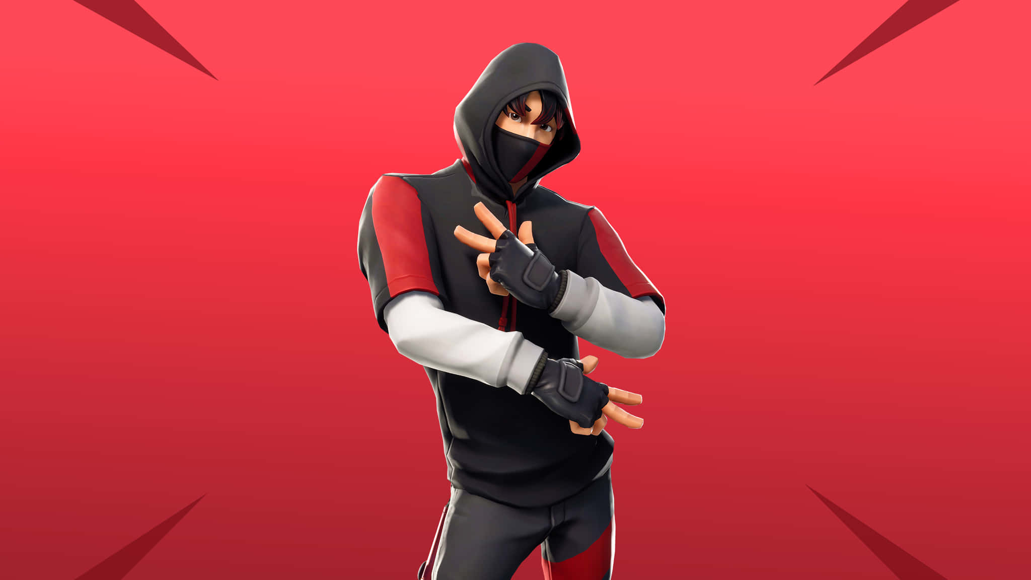 Fortnite Ikonik Skin 桌布 壁紙 — 一個穿著黑、紅、白連帽衫的Fortnite角色在鮮紅色背景和銳利幾何圖案前擺姿勢。