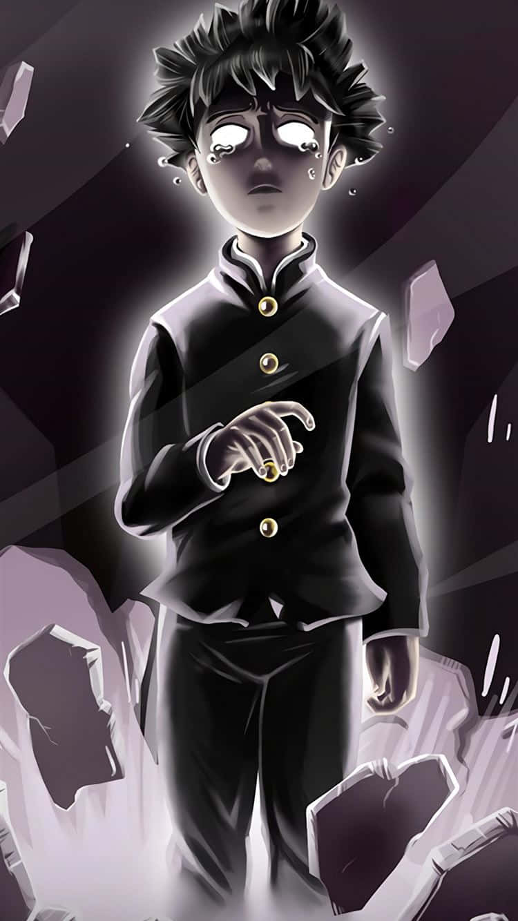 動漫男孩 桌布 壁紙 — 一個穿著黑色制服的年輕動畫男孩站在破碎的水晶碎片中間，眼睛發光，表情嚴肅。