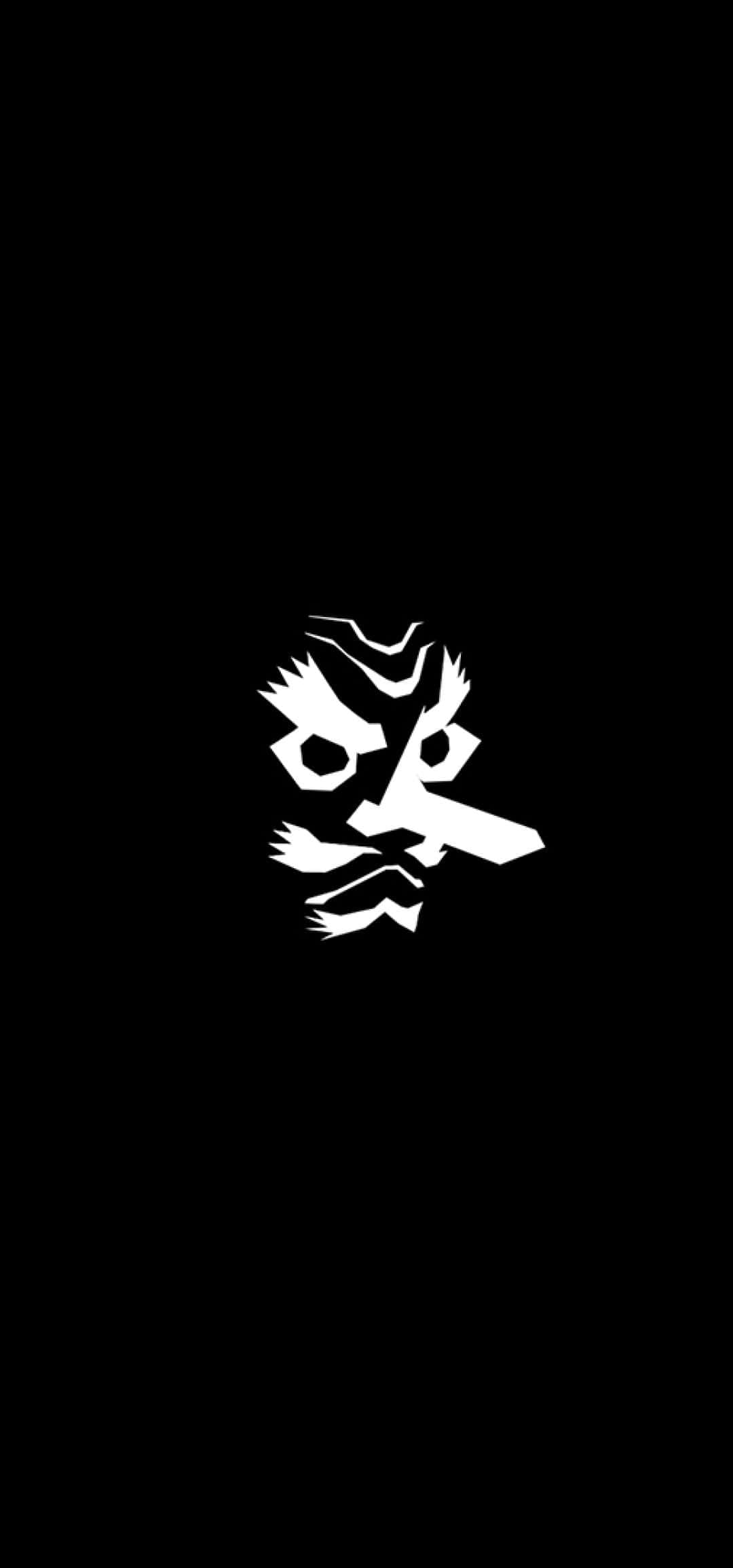 鬼滅之刃 桌布 壁紙 — 一個突出的白色抽象面孔，具有鋸齒狀特徵和長鼻子，居中在純黑色背景上。