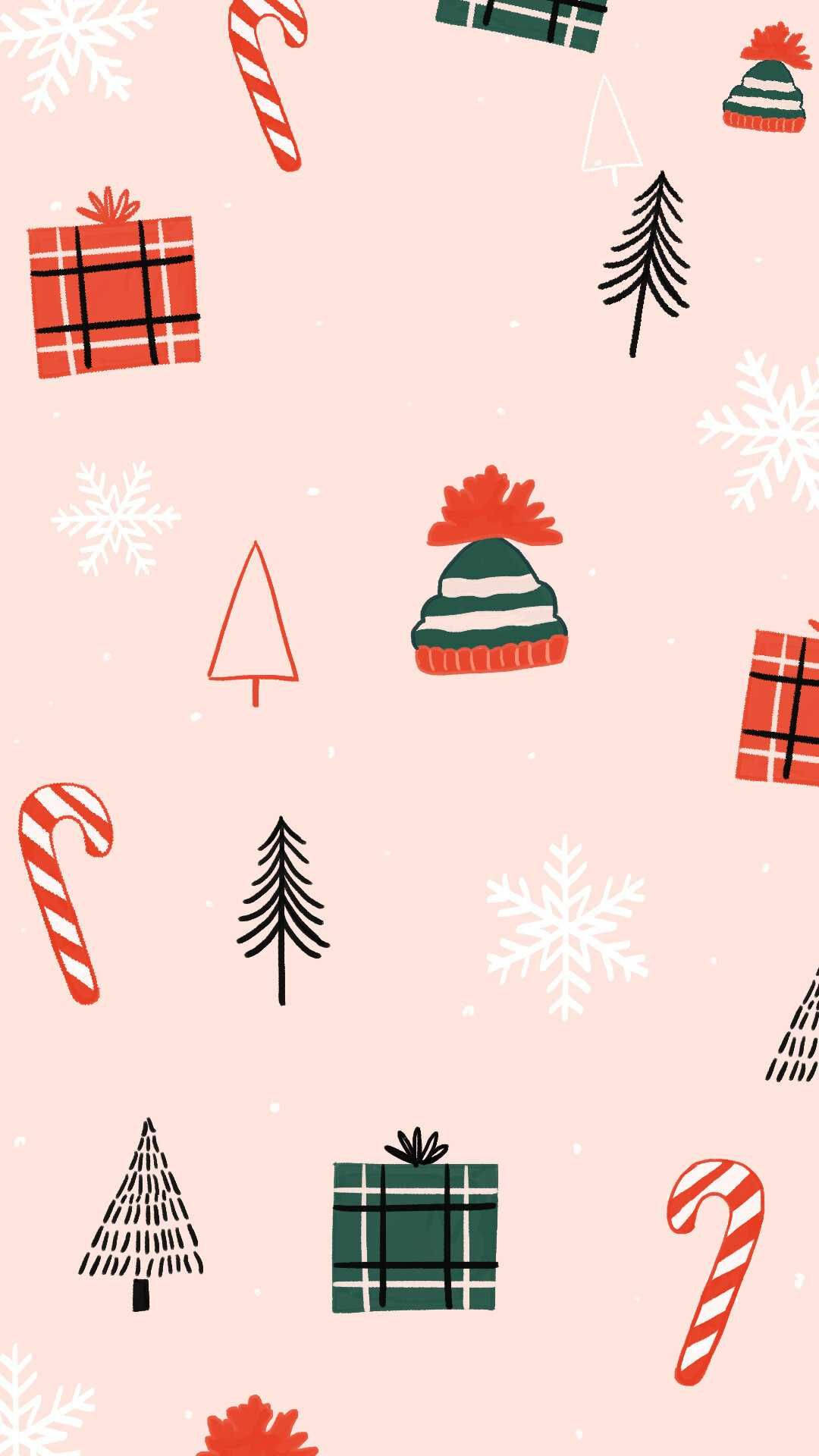 Kawaii Christmas 桌布 壁紙 — 一個節日圖案，包含糖果手杖、樹木、雪花和禮物，散落在柔和的粉紅色背景上。