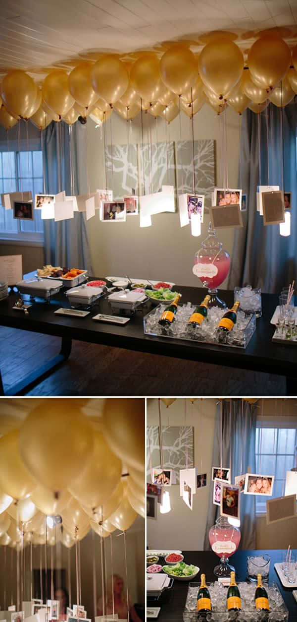 Wedding 桌布 壁紙 — 一個節日室內派對佈置，配有金色氣球、照片卡，以及一個提供香檳和食物的自助餐桌。