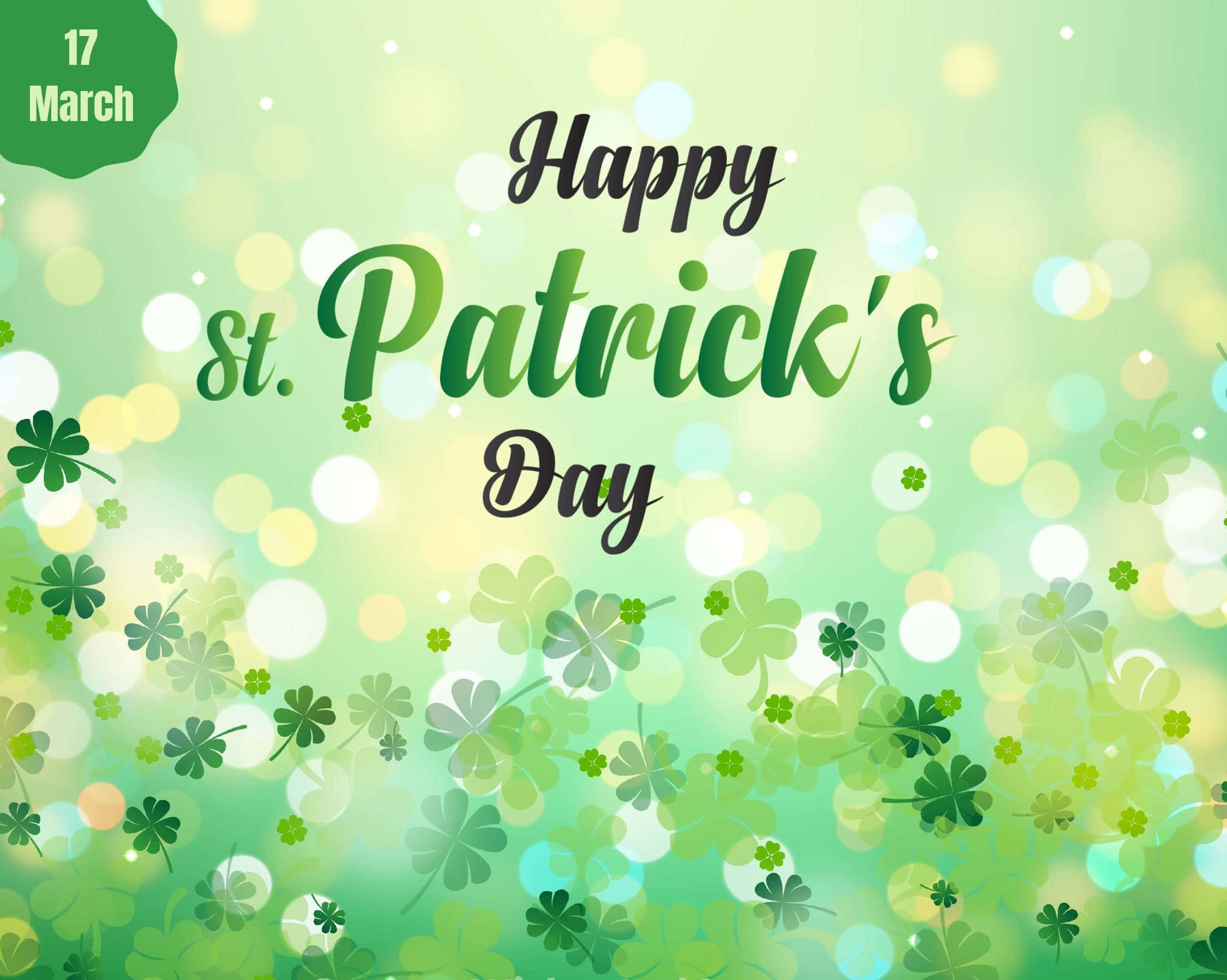 St Patrick's Day 桌布 壁紙 — 一個節日氣氛的綠色背景，帶有漂浮的三葉草和散景燈光，以歡快的文字慶祝聖派翠克節。