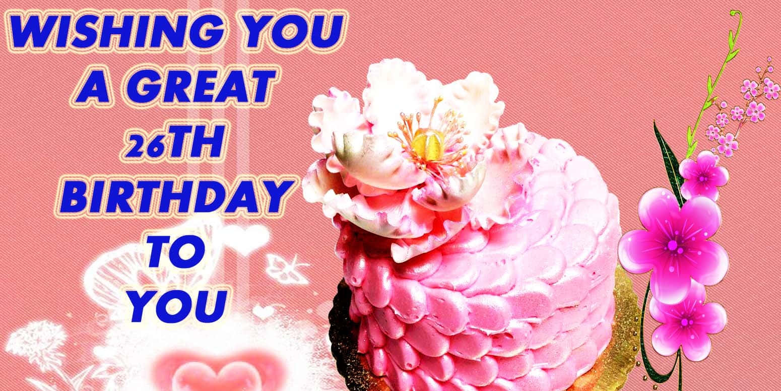 Birthday Wishes 桌布 壁紙 — 一個節日粉紅色生日蛋糕，上面裝飾著一朵大白色花朵和櫻花，背景為粉紅色，並帶有慶祝文字。