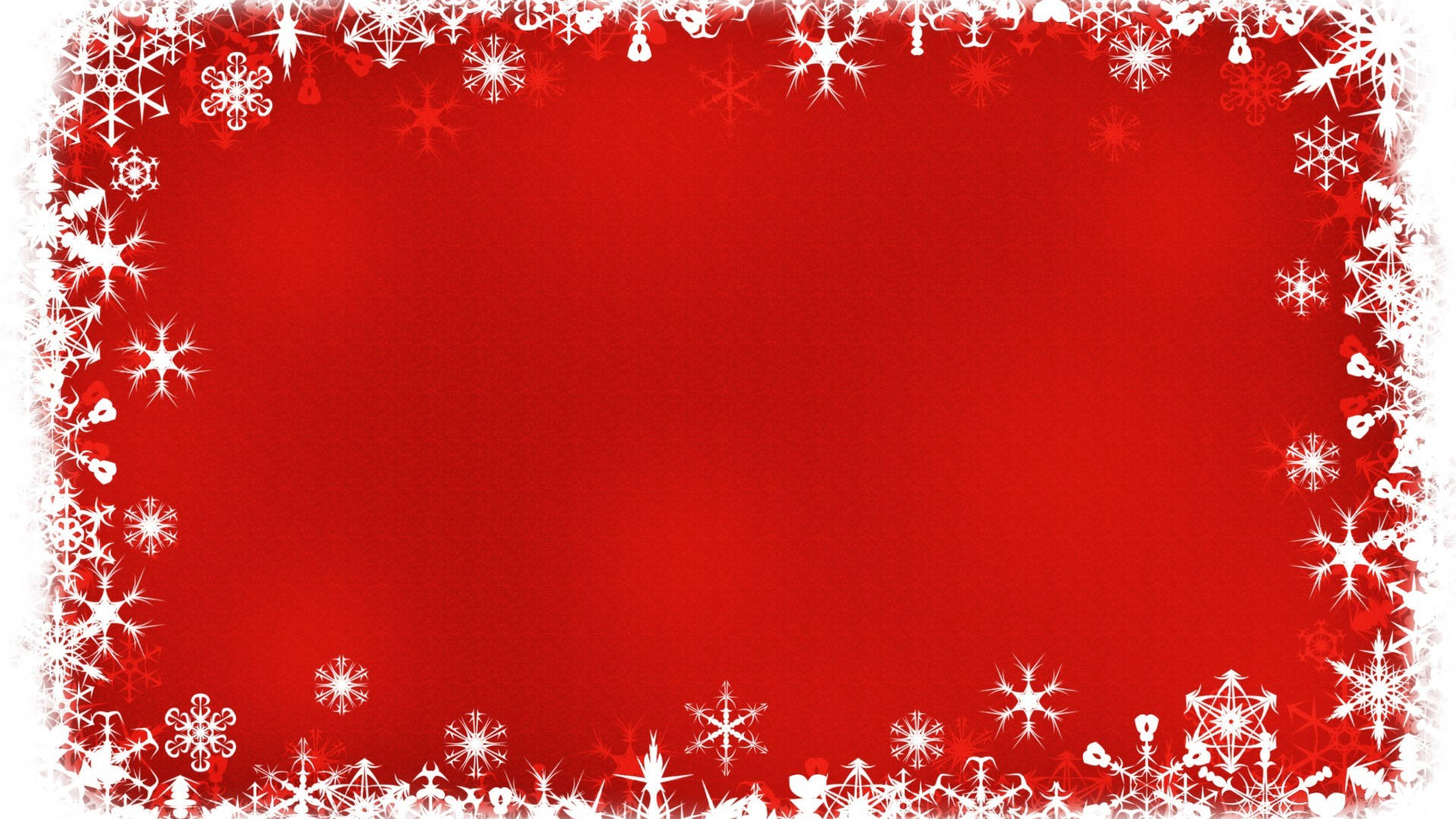 red christmas 桌布 壁紙 — 一個節日紅色背景，由複雜的白色雪花框出節日邊框。