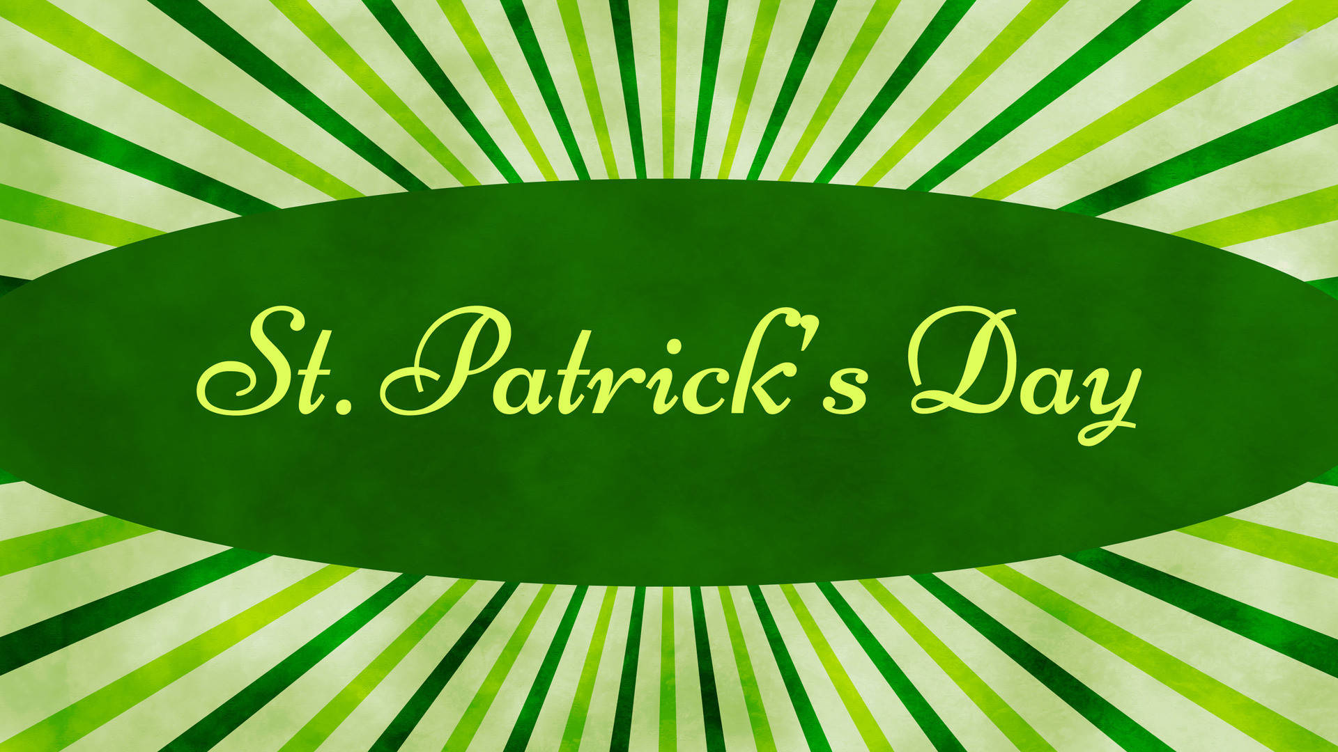St Patrick's Day 桌布 壁紙 — 一個節日綠色橢圓形，帶有草書的聖派翠克節文字，在綠色和奶油色條紋的太陽光線圖案中散發光芒。