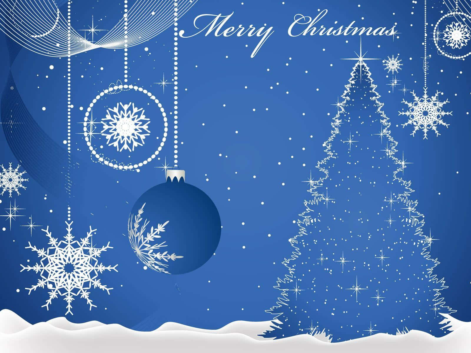 Christmas Card 桌布 壁紙 — 一個節日藍色聖誕場景，有雪花、裝飾品和一棵樹，背景是星空，並帶有 'Merry Christmas' 字樣。