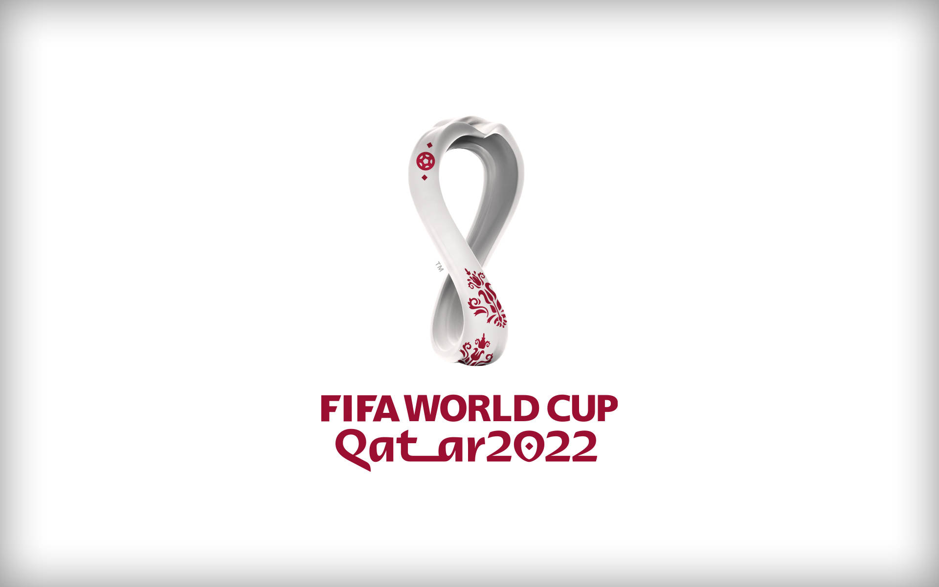 World 桌布 壁紙 — 一個簡潔的白色無限符號，帶有紅色花卉圖案和文字 FIFA WORLD CUP Qatar 2022，背景為純白色。