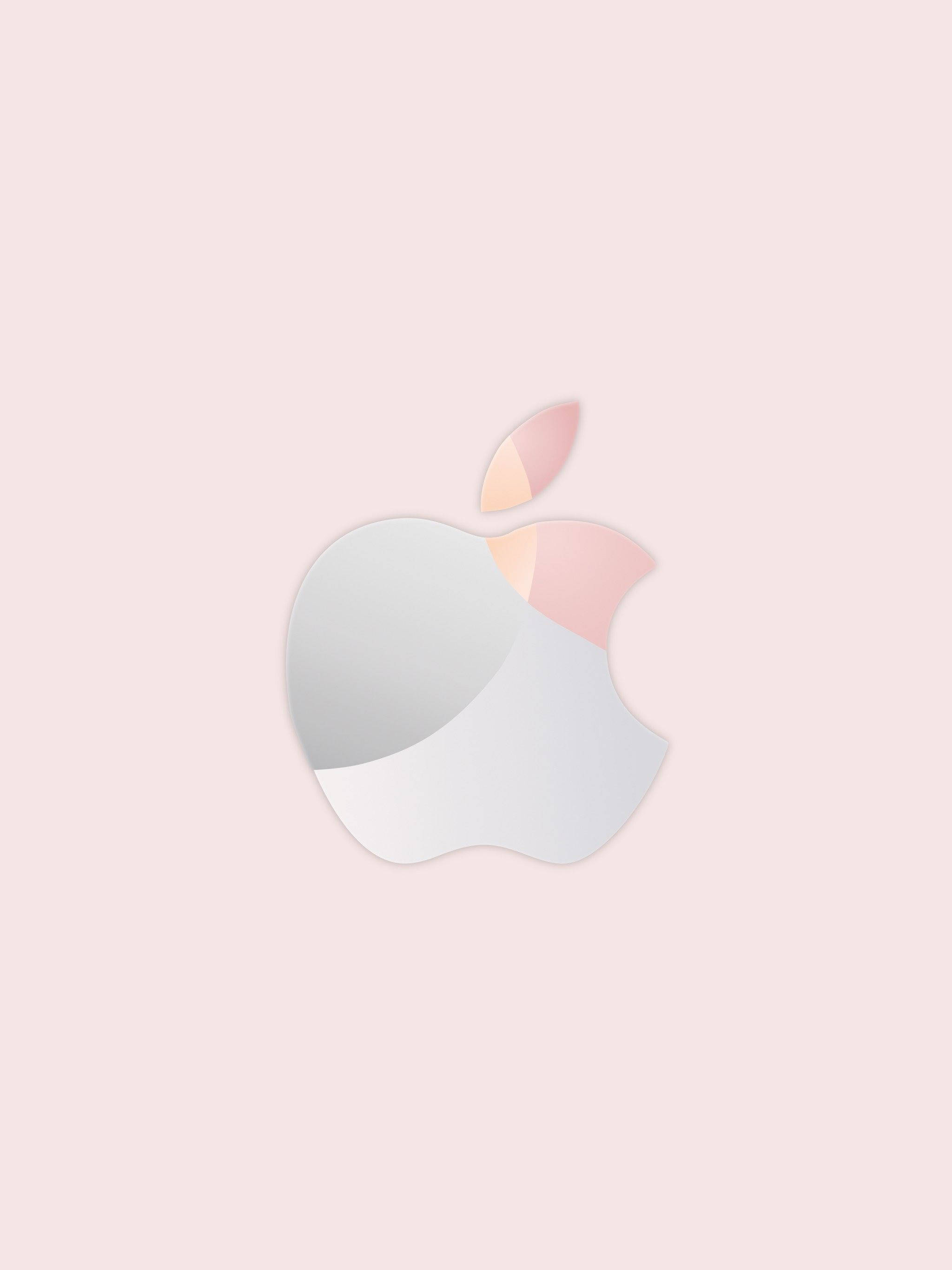 蘋果標誌 桌布 壁紙 — 一個簡約的Apple標誌，在淡粉色背景上帶有柔和粉紅和蜜桃色漸變點綴。