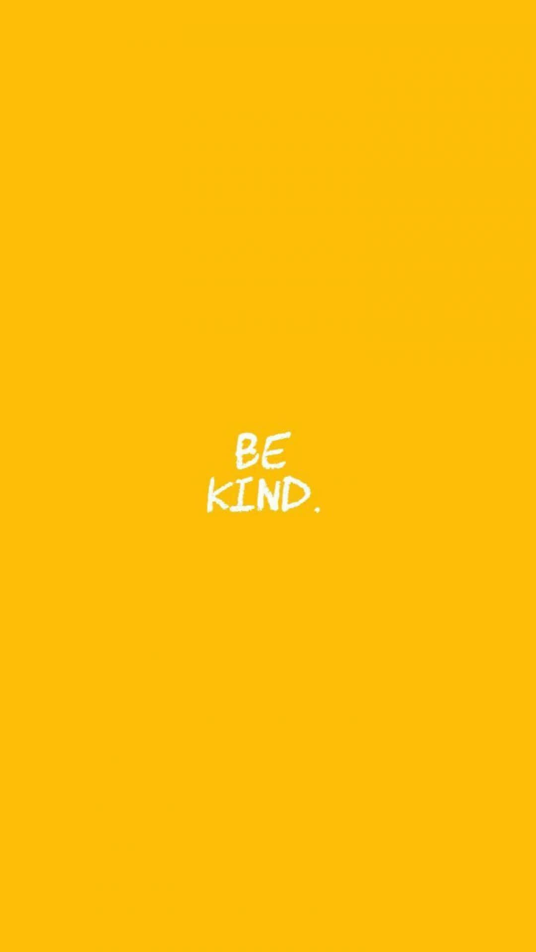 Quote 桌布 壁紙 — 一個簡約的亮黃色背景，中央有白色手寫短語「BE KIND.」。