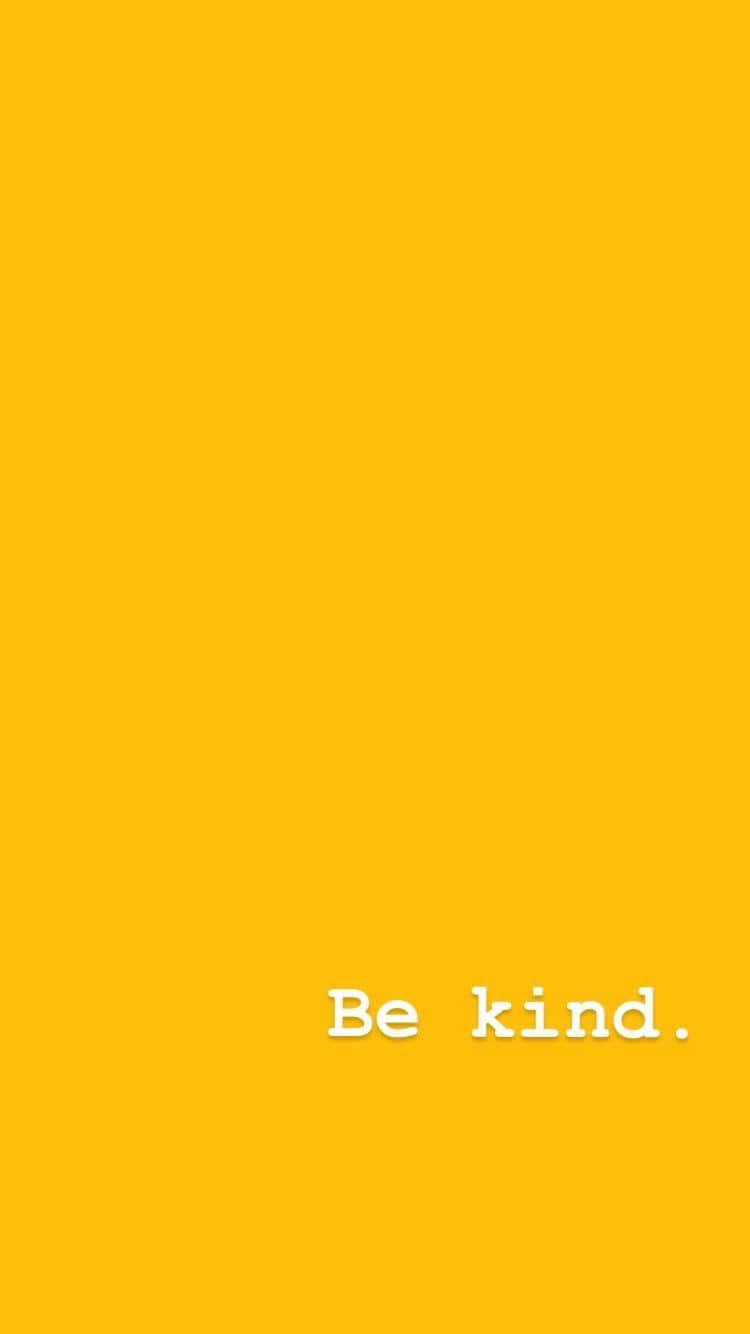 Yellow Phone 桌布 壁紙 — 一個簡約的亮黃色背景，白色文字「Be kind.」居中靠近底部。