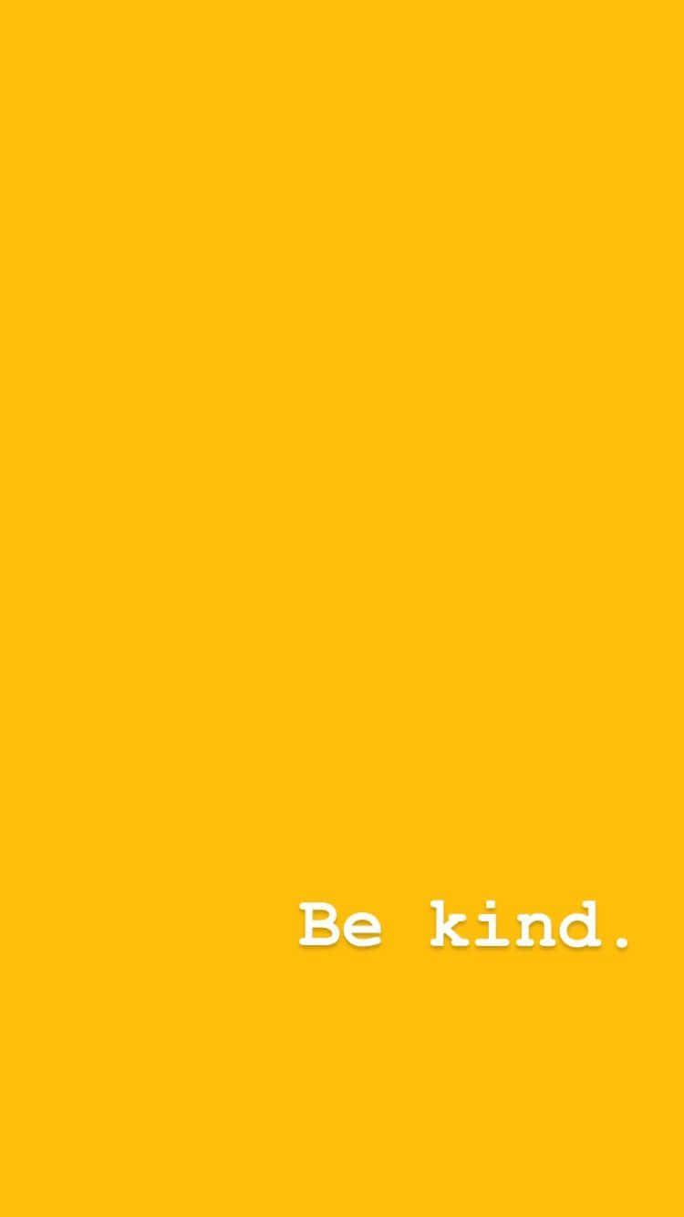 桌布 壁紙 — 一個簡約的亮黃色背景，白色文字「Be kind.」居中靠近底部。