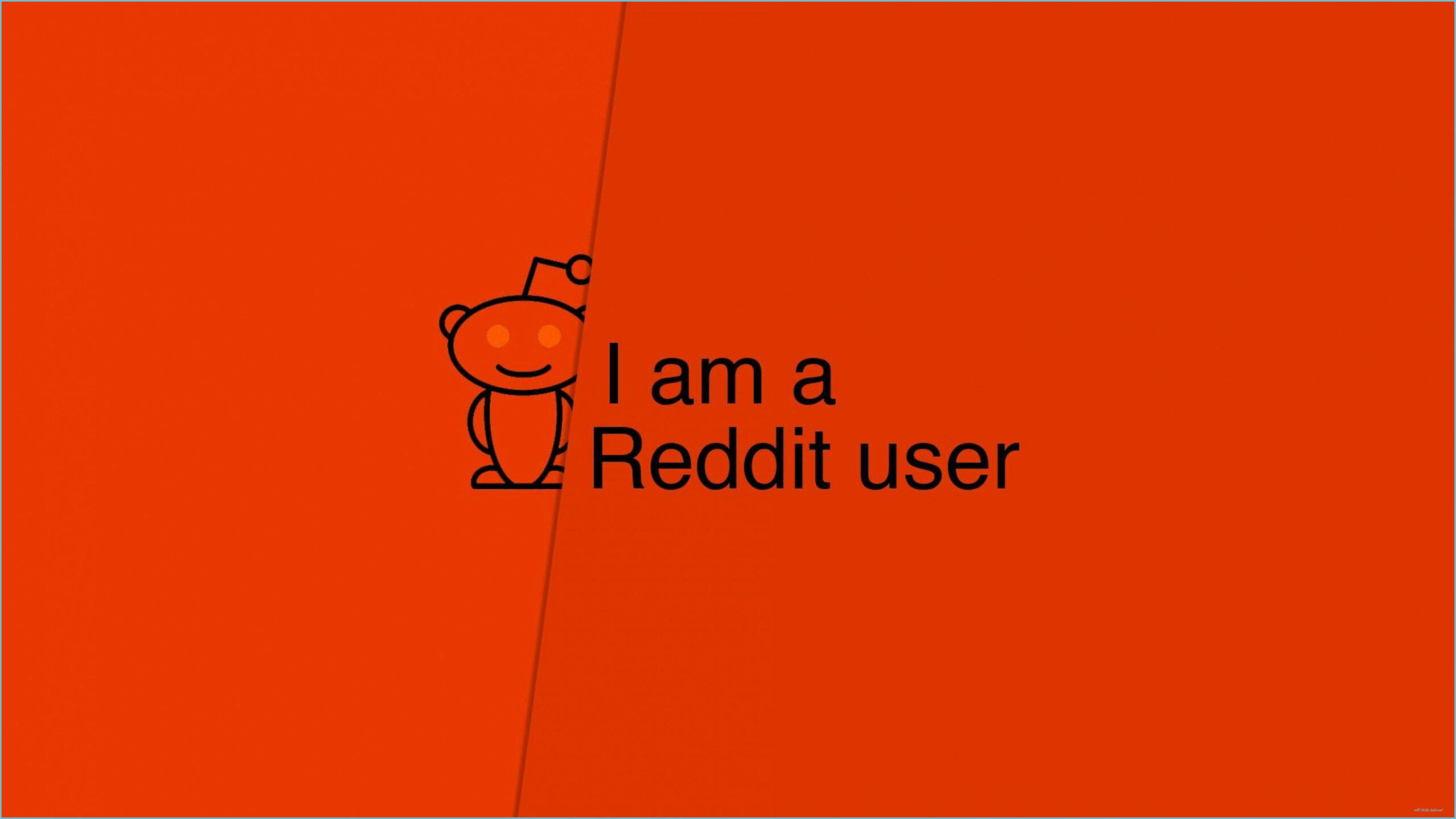Reddit 桌布 壁紙 — 一個簡約的橙色背景，上面有 Reddit 外星人吉祥物和黑色文字「我是 Reddit 用戶」。