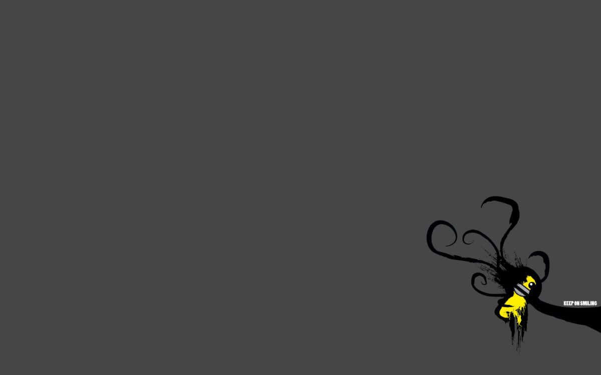 Minimalist Halloween 桌布 壁紙 — 一個簡約的深灰色桌布，右下角有一個帶黑色觸手和笑臉的黃色卡通小角色。