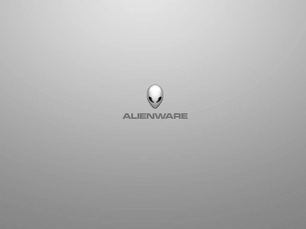 white alienware 桌布 壁紙 — 一個簡約的灰色漸變背景，標誌性的銀色Alienware外星人頭標誌居中於品牌名稱上方。