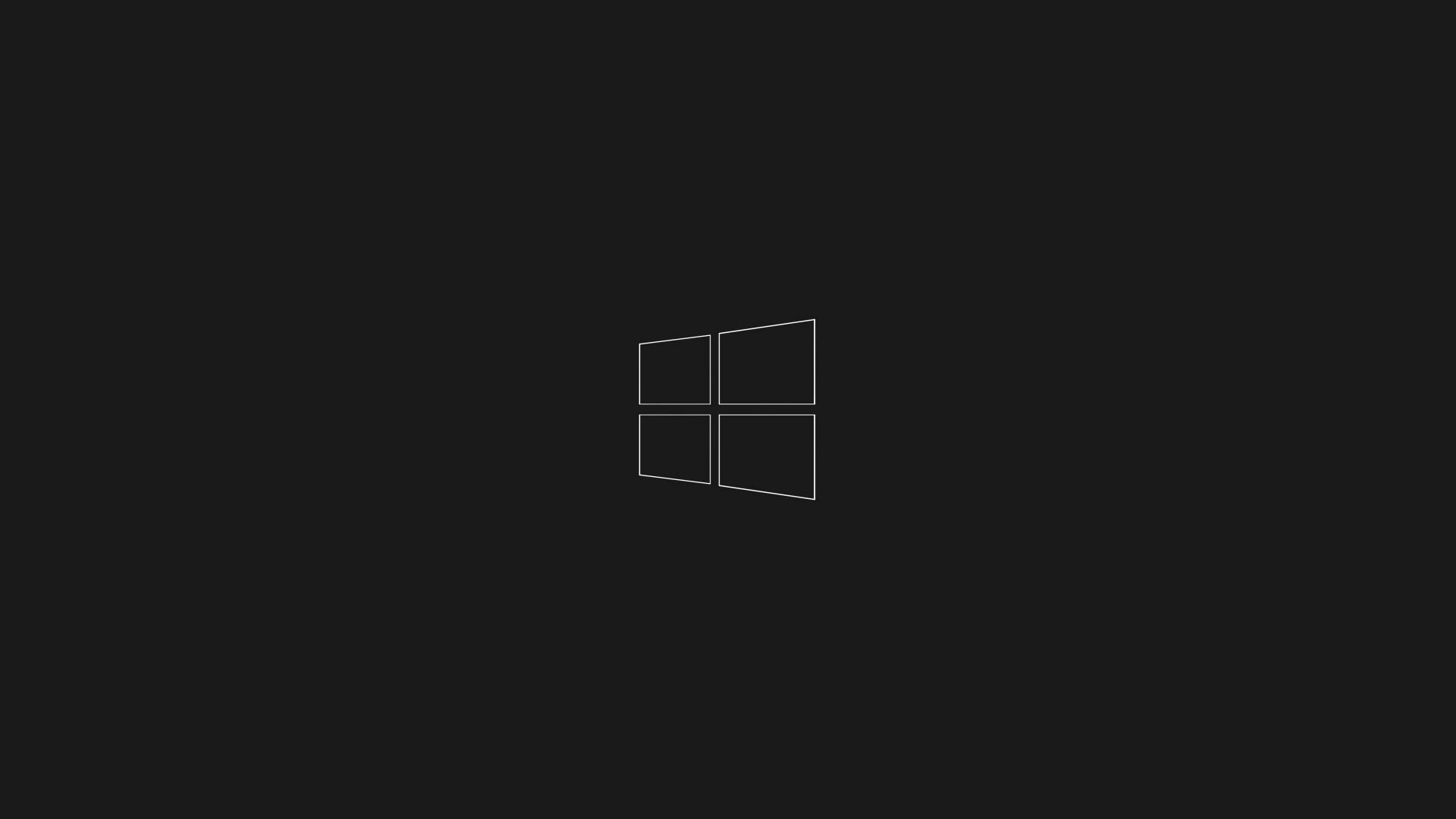 黑色 Windows 10 桌布 壁紙 — 一個簡約的白色Windows標誌居中在純黑色背景上。