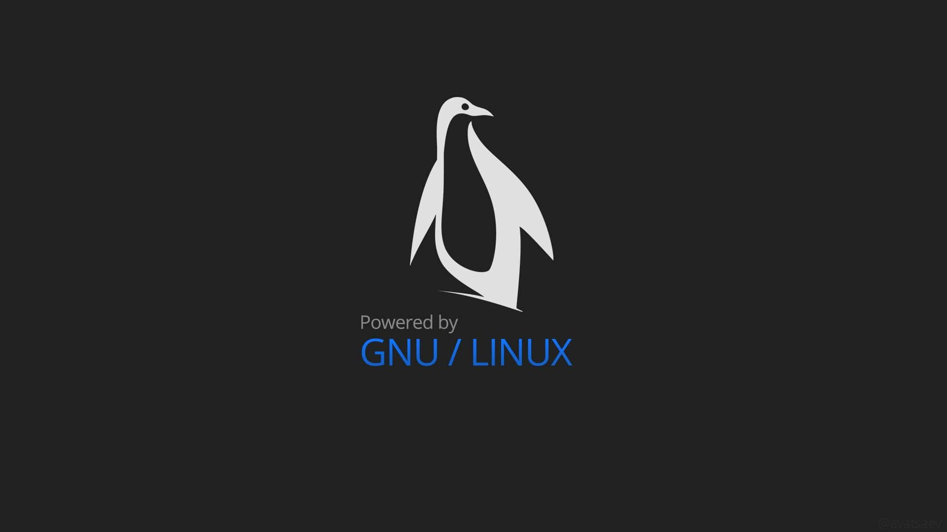 Linux 桌布 壁紙 — 一個簡約的白色企鵝標誌，居中在深灰色背景上，藍色文字寫著 Powered by GNU LINUX。