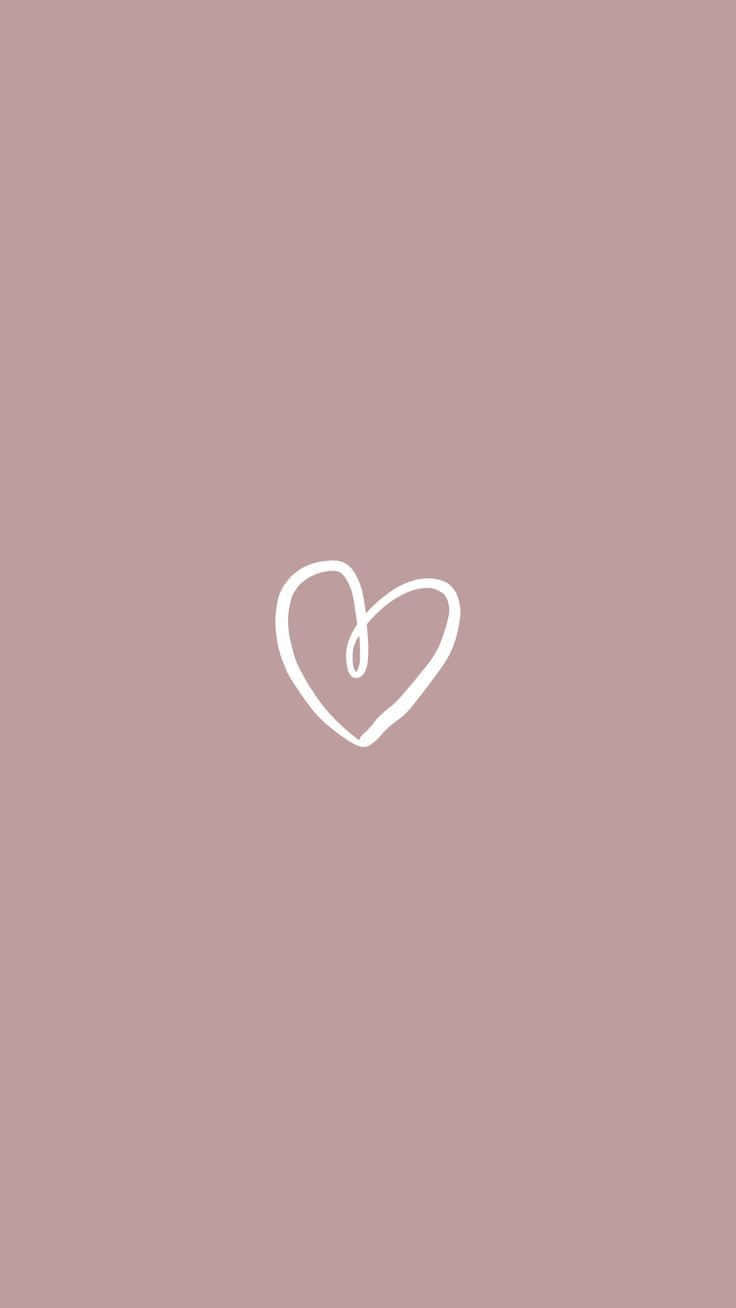 Simple Pink 桌布 壁紙 — 一個簡約的白色心形輪廓，居中於柔和的紫紅色背景上。