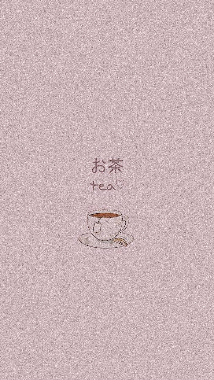 一個簡單的茶杯插圖，帶有日文字元和心形，背景為粉紅色。 — 柔和美學 GIF 壁紙