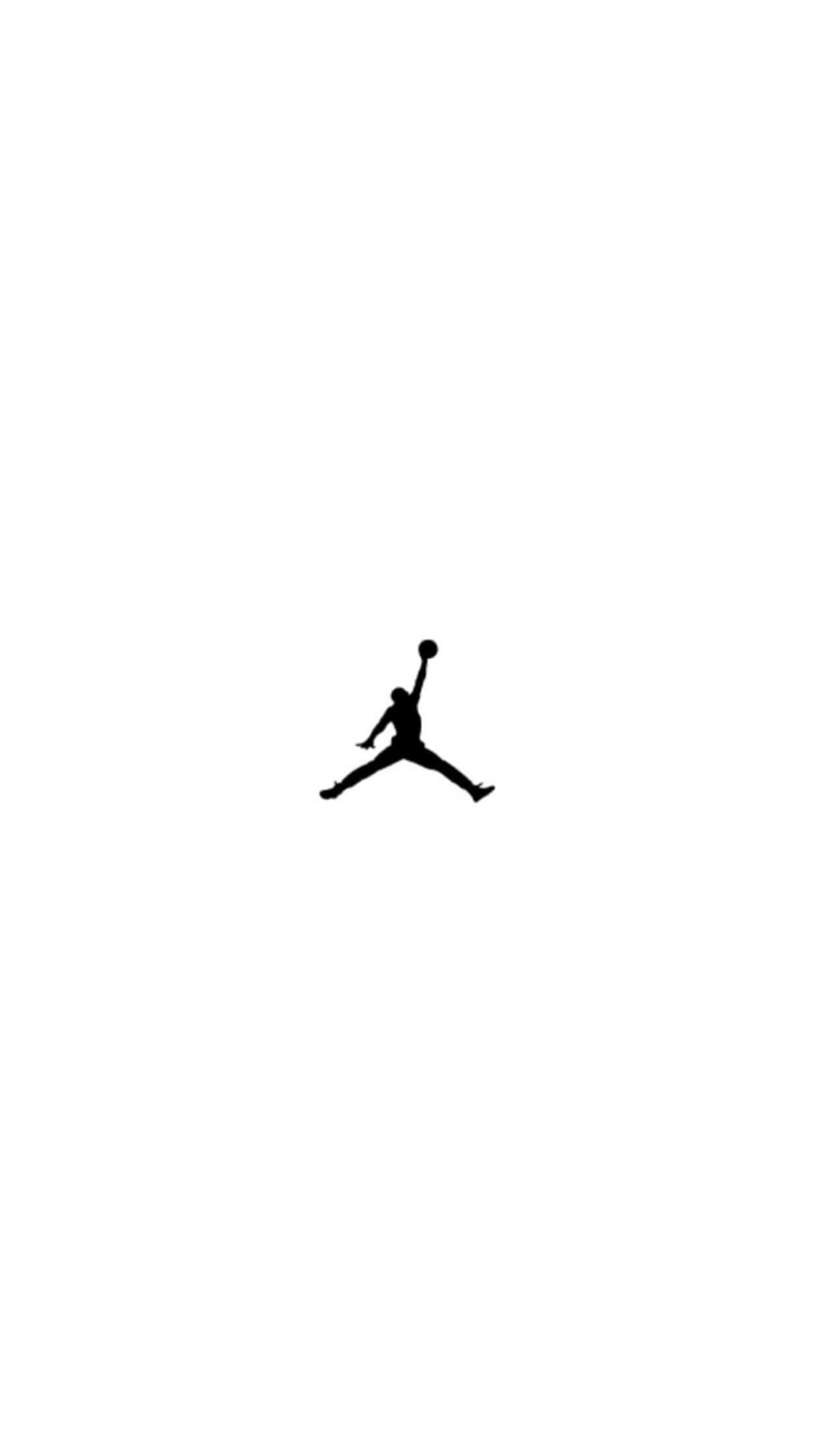 Jordan Logo Phone 桌布 壁紙 — 一個籃球運動員在半空中灌籃的鮮明黑色剪影，背景為純白色。
