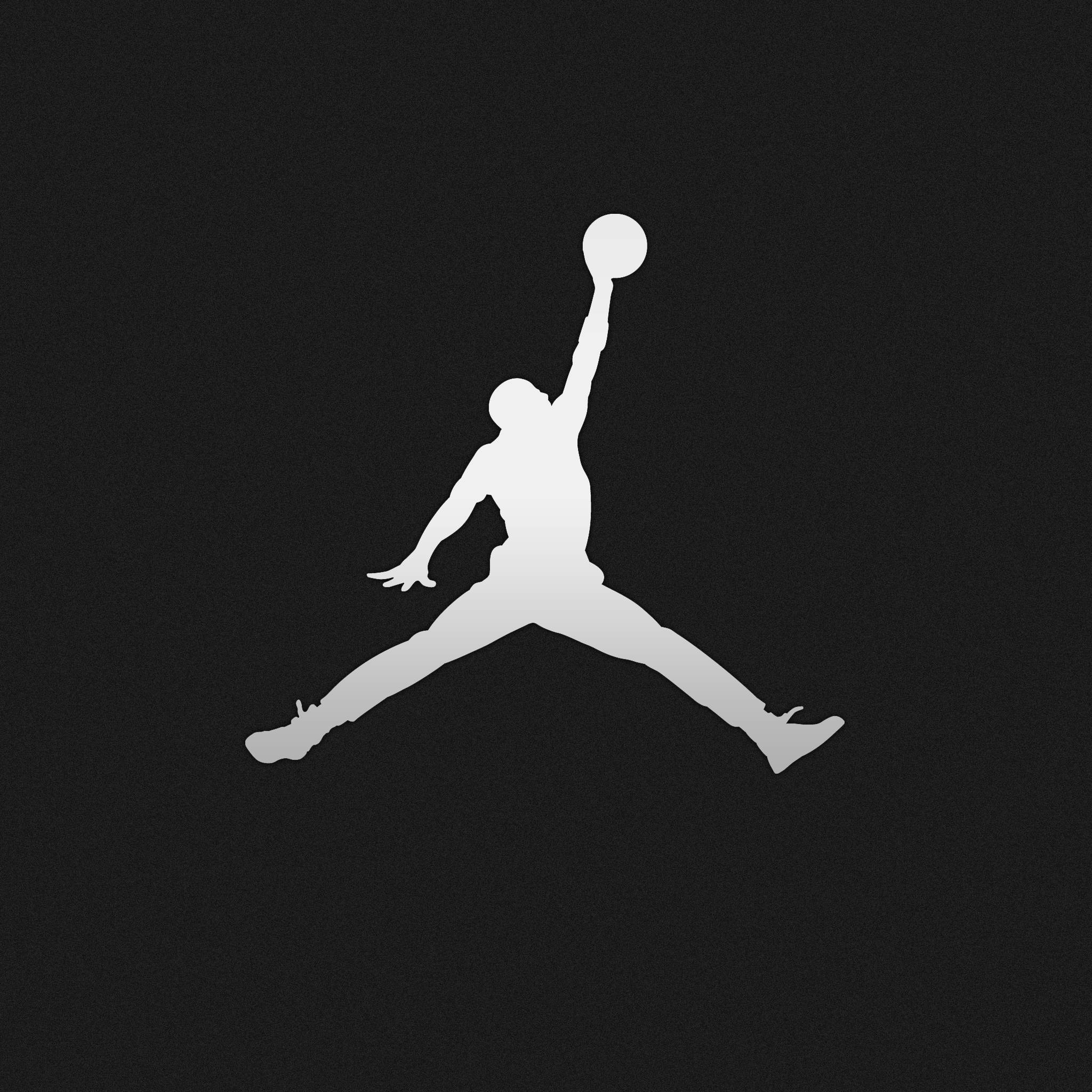 Jordan Logo 桌布 壁紙 — 一個籃球運動員在紋理黑色背景上半空灌籃的鮮明白色剪影。