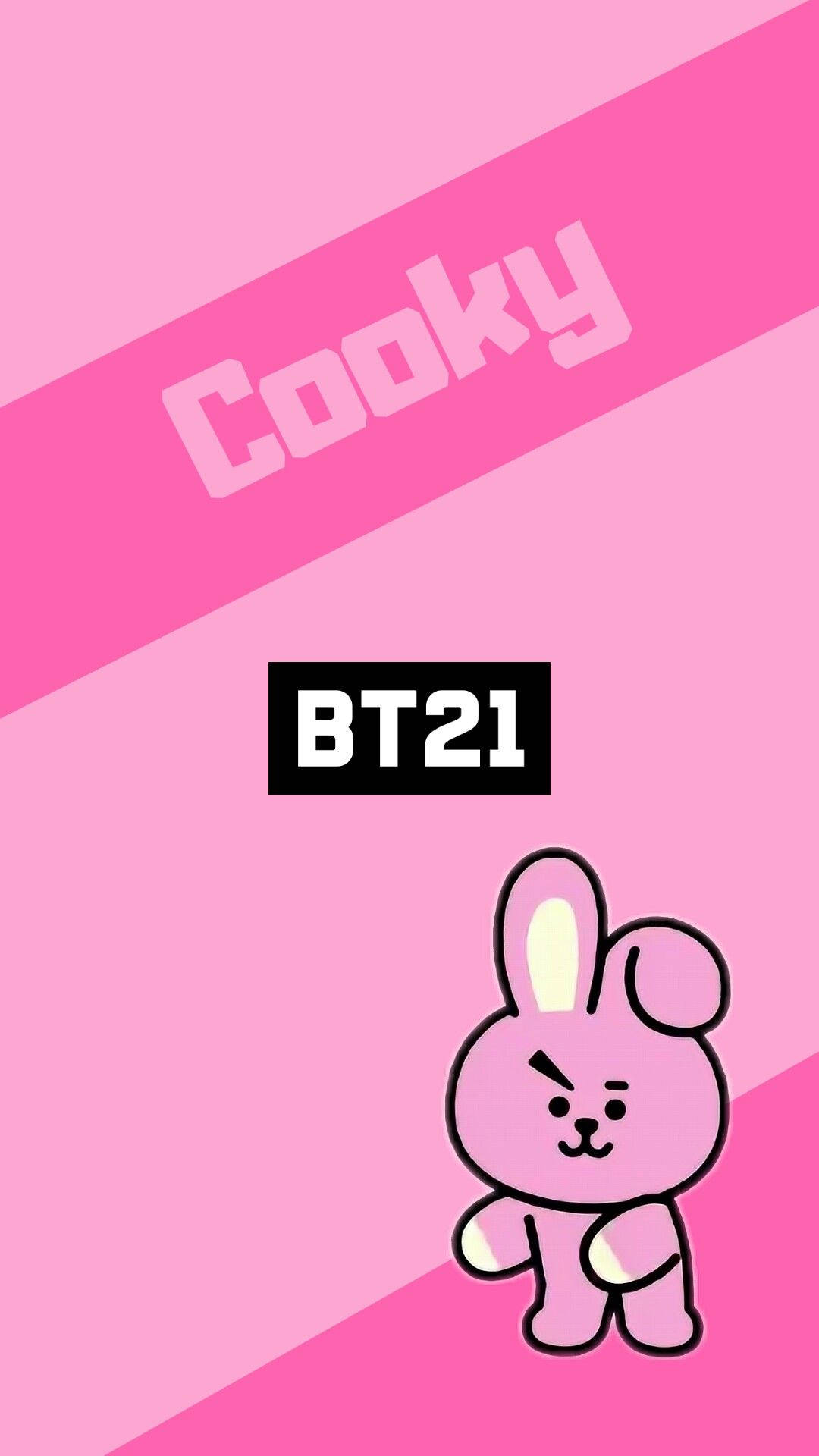 Cooky Bt21 桌布 壁紙 — 一個粉紅色卡通兔子角色帶著憤怒的表情，站在對角粉紅色漸變背景上，有 'Cooky' 和 'BT21' 文字。