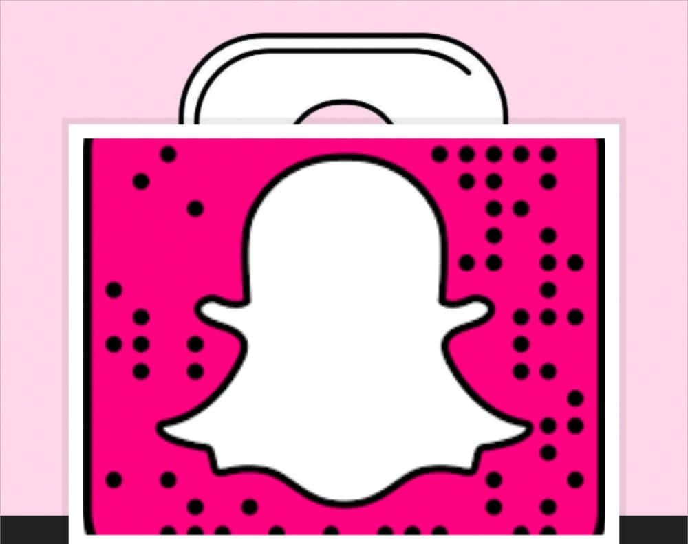 snap 桌布 壁紙 — 一個粉紅色圓點購物袋，正面中央有一個白色 Snapchat 鬼魂標誌。