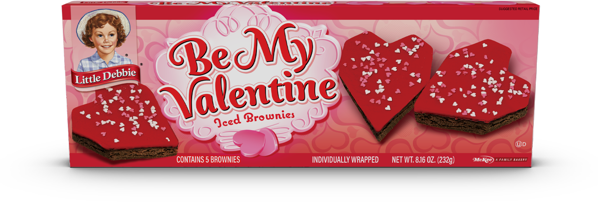 布朗尼 桌布 壁紙 — 一個粉紅色盒子，裡面裝著 Little Debbie Be My Valentine 心形糖霜布朗尼，上面有白色糖粒。