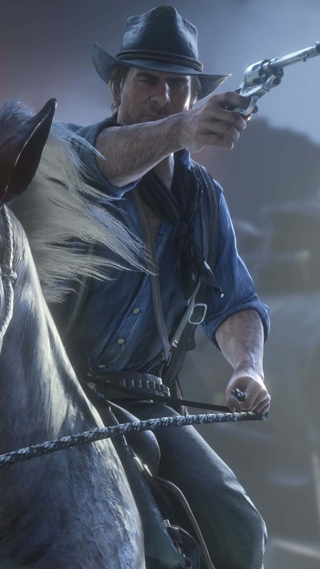 Android Red Dead Redemption 2 桌布 壁紙 — 一個粗獷的牛仔騎在馬上，在朦朧的西部背景下，專注地瞄準左輪手槍。