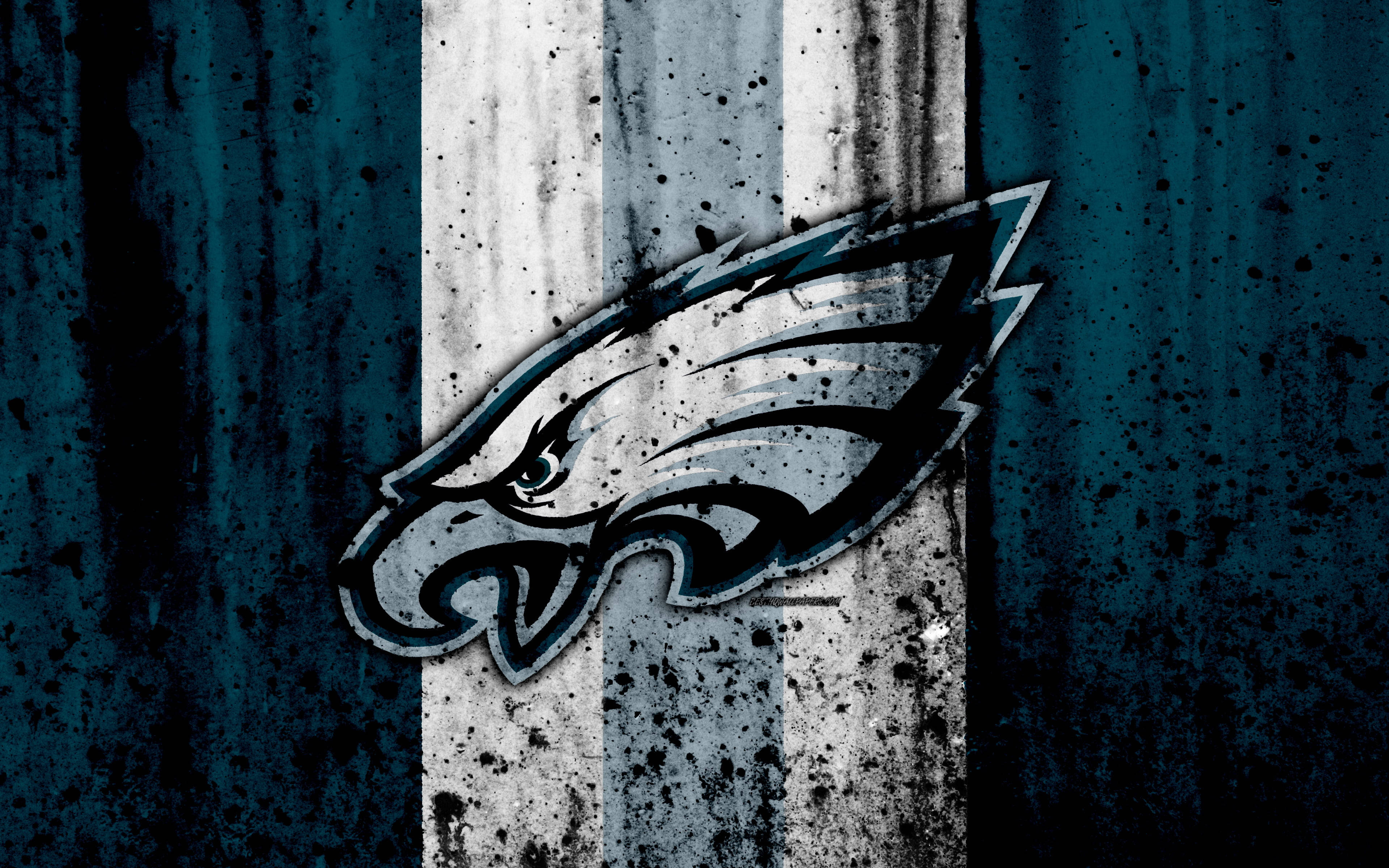 NFL Team Logo 桌布 壁紙 — 一個粗糙的費城老鷹隊標誌，帶有飛濺的油漆和風化的條紋，背景為深青色。