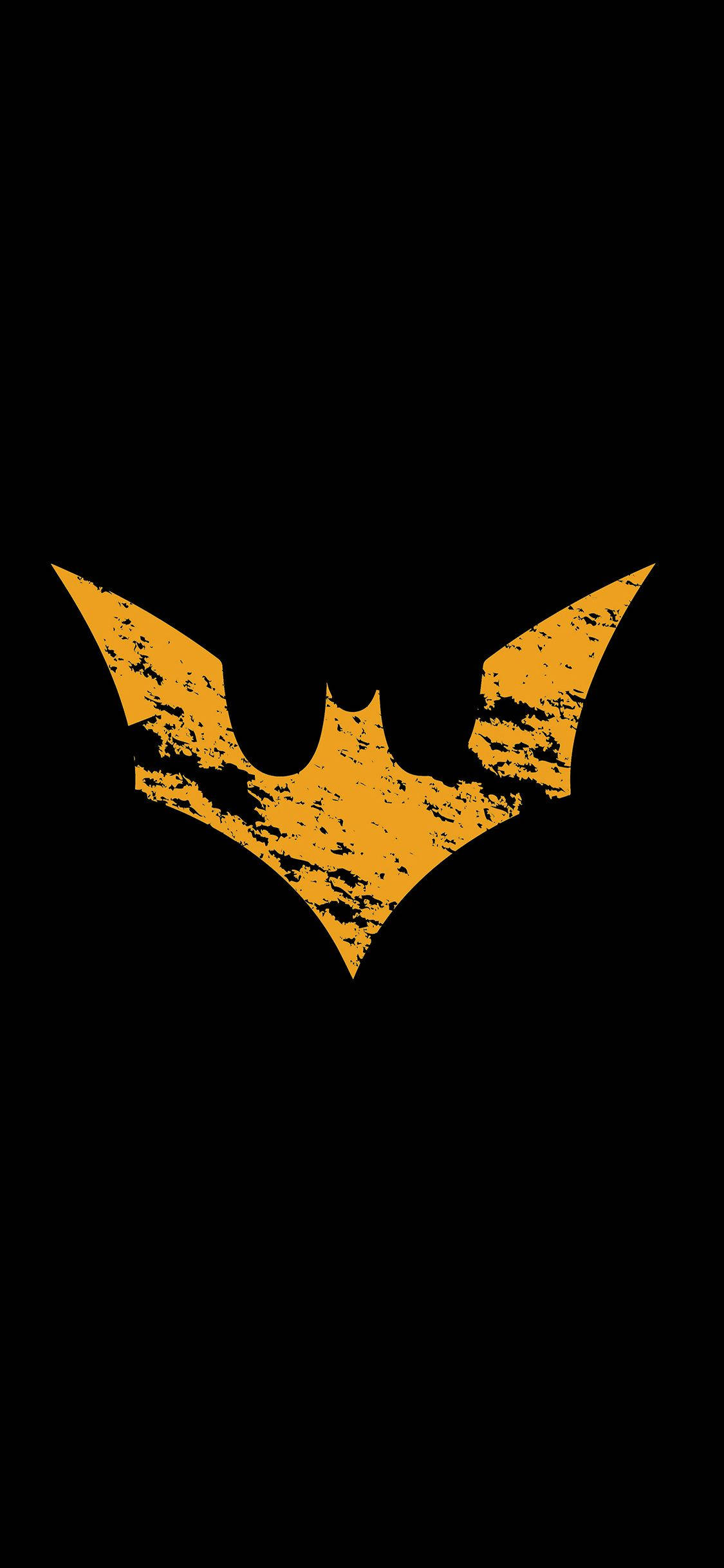 The Batman 桌布 壁紙 — 一個粗糙紋理的金色蝙蝠標誌，居中在純黑色背景上。