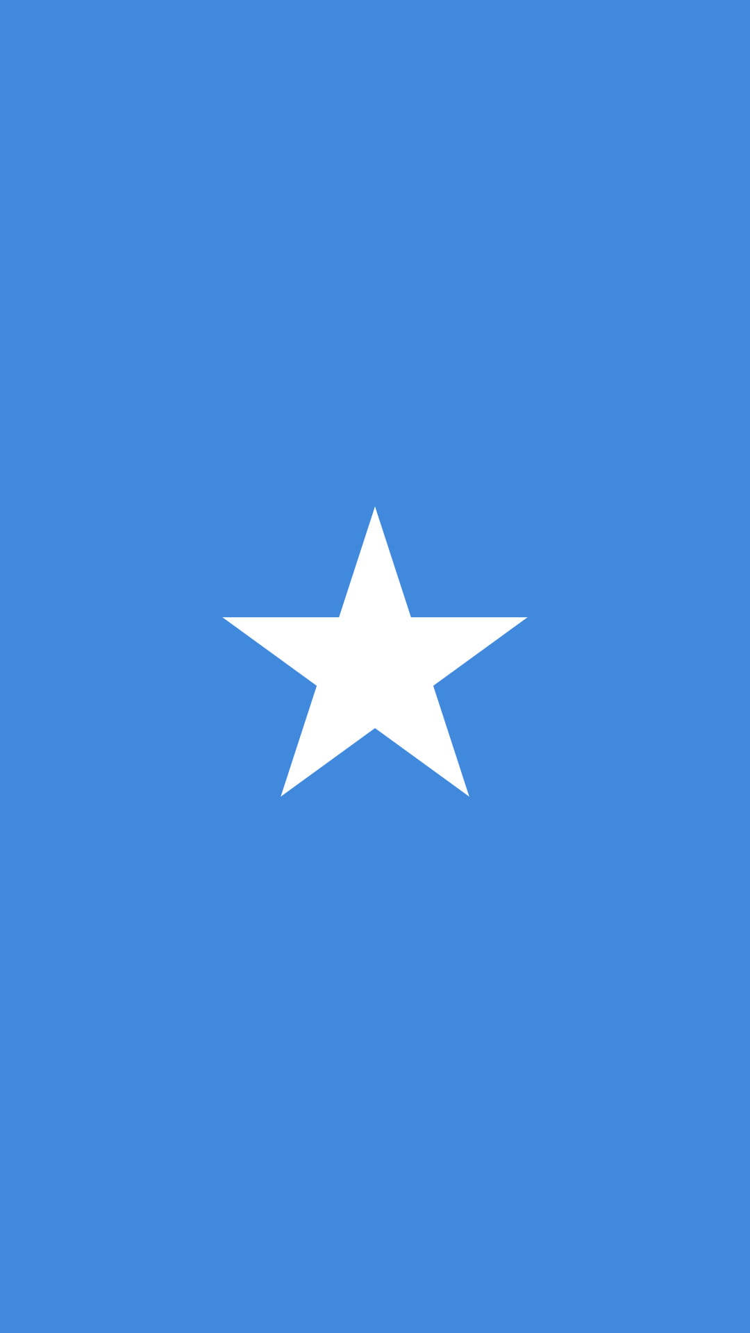 Somalia 桌布 壁紙 — 一個粗體白色五角星居中在純藍色背景上。