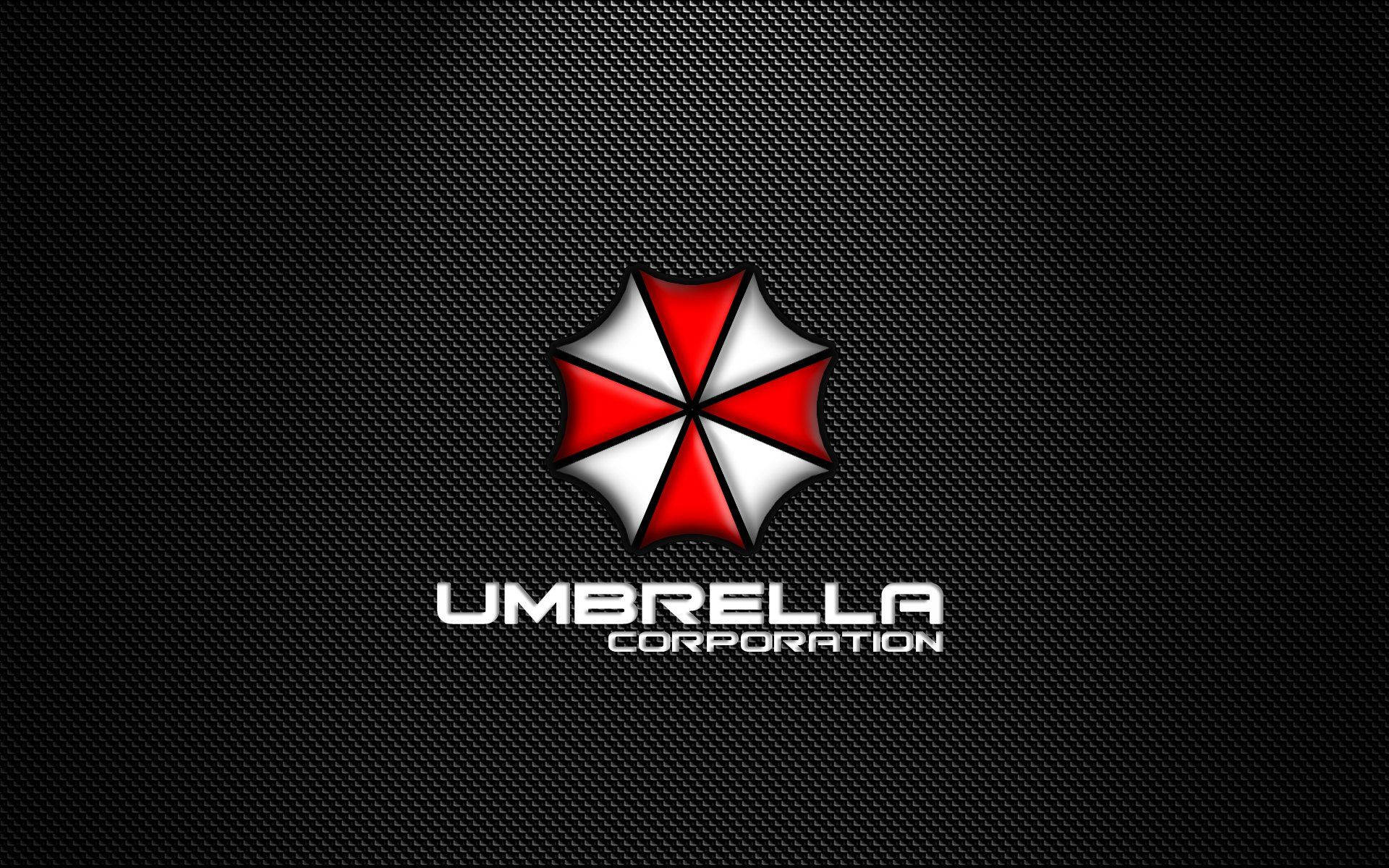 evil 桌布 壁紙 — 一個紅白相間的雨傘標誌，中央有 'UMBRELLA CORPORATION' 文字，背景為黑色碳纖維紋理。