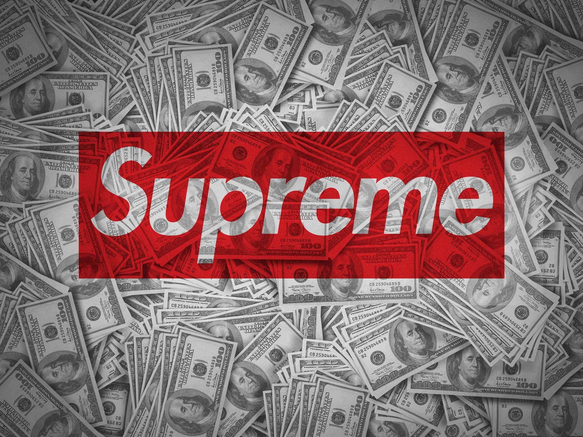 金錢 桌布 壁紙 — 一個紅色Supreme標誌覆蓋在黑白百元鈔票的海洋上，營造出大膽的奢華街頭服飾宣言。