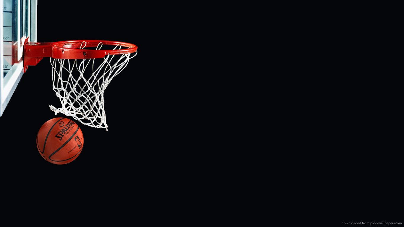 NBA 桌布 壁紙 — 一個紅色籃球網，上面掛著一個 Spalding 籃球，背景是 stark 黑色。