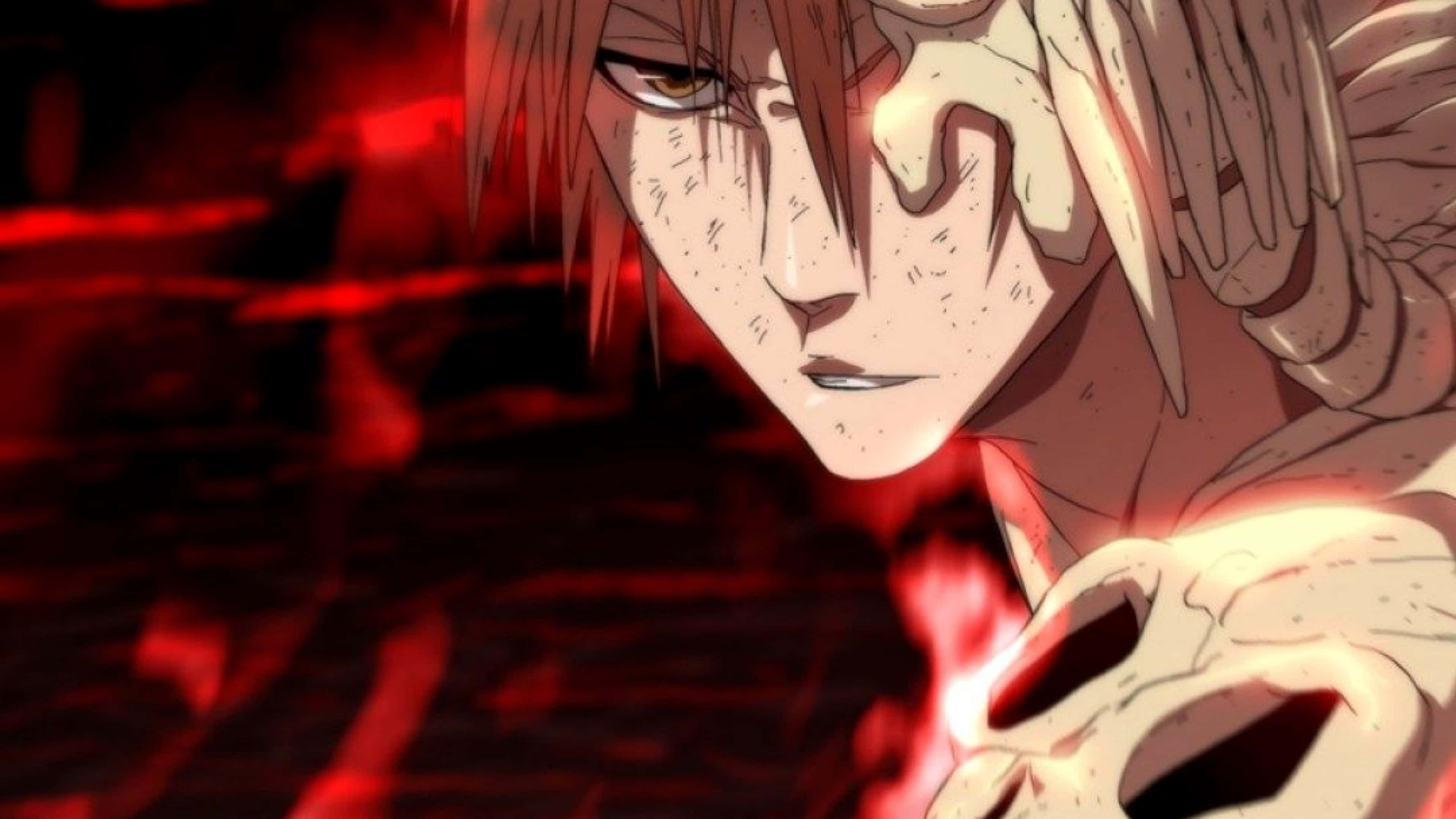 Ichigo 4K 桌布 壁紙 — 一個紅髮、眼睛發光的動漫角色在火紅背景前手持一個頭骨。
