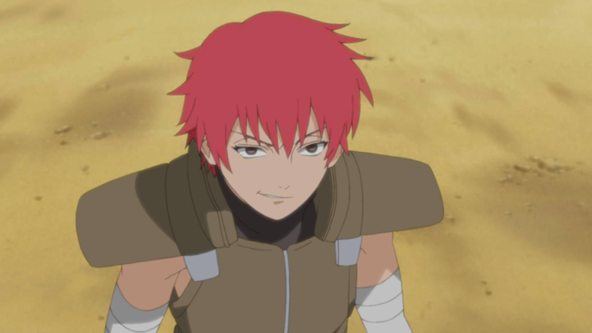 Sasori 桌布 壁紙 — 一個紅髮動漫角色帶著堅定的表情站在沙質沙漠景觀中。