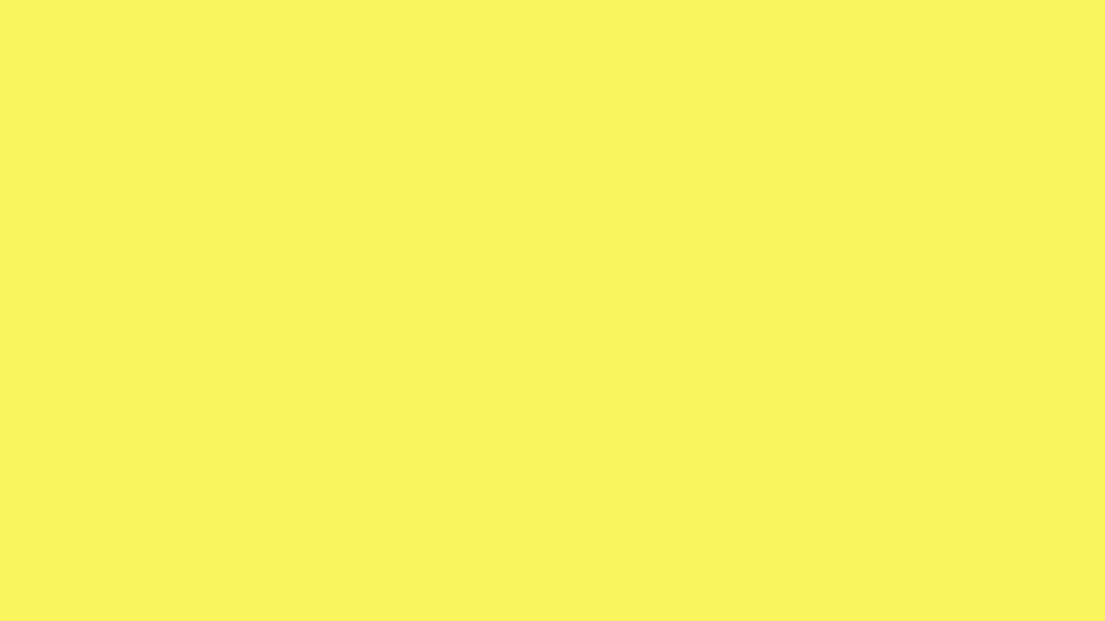 Solid Yellow 桌布 壁紙 — 一個純色鮮黃色背景填滿整個畫面，沒有其他元素。