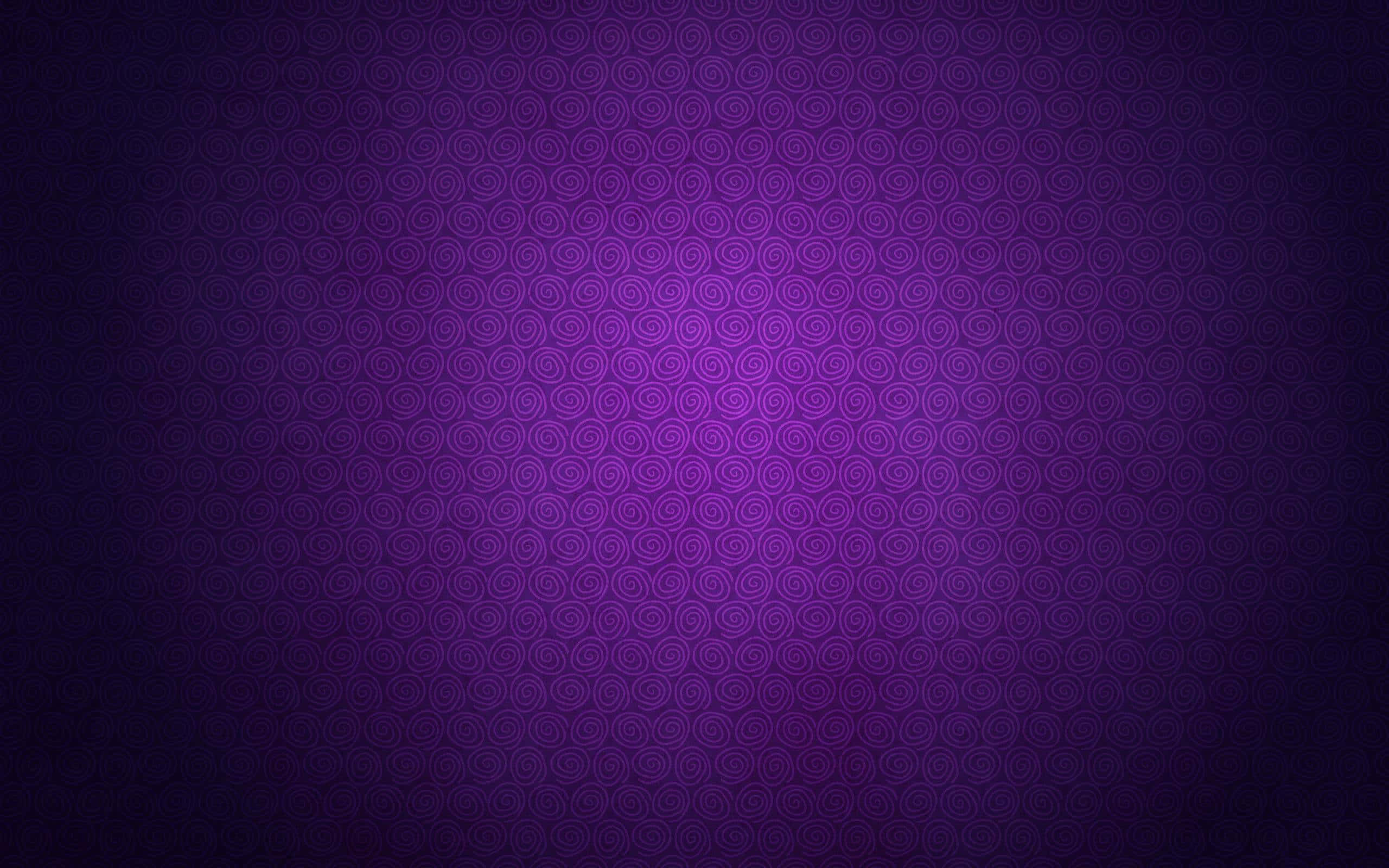 Purple Texture 桌布 壁紙 — 一個紫色漸變背景，帶有重複的螺旋圖案，從暗中心漸變到亮中心。