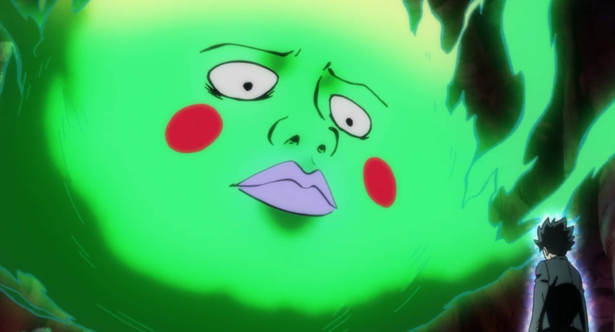 Mob Psycho 100 Ekubo 桌布 壁紙 — 一個細小角色站在一個巨大發光綠色面孔前，該面孔有紅色臉頰和大眼睛，處於動畫場景中。