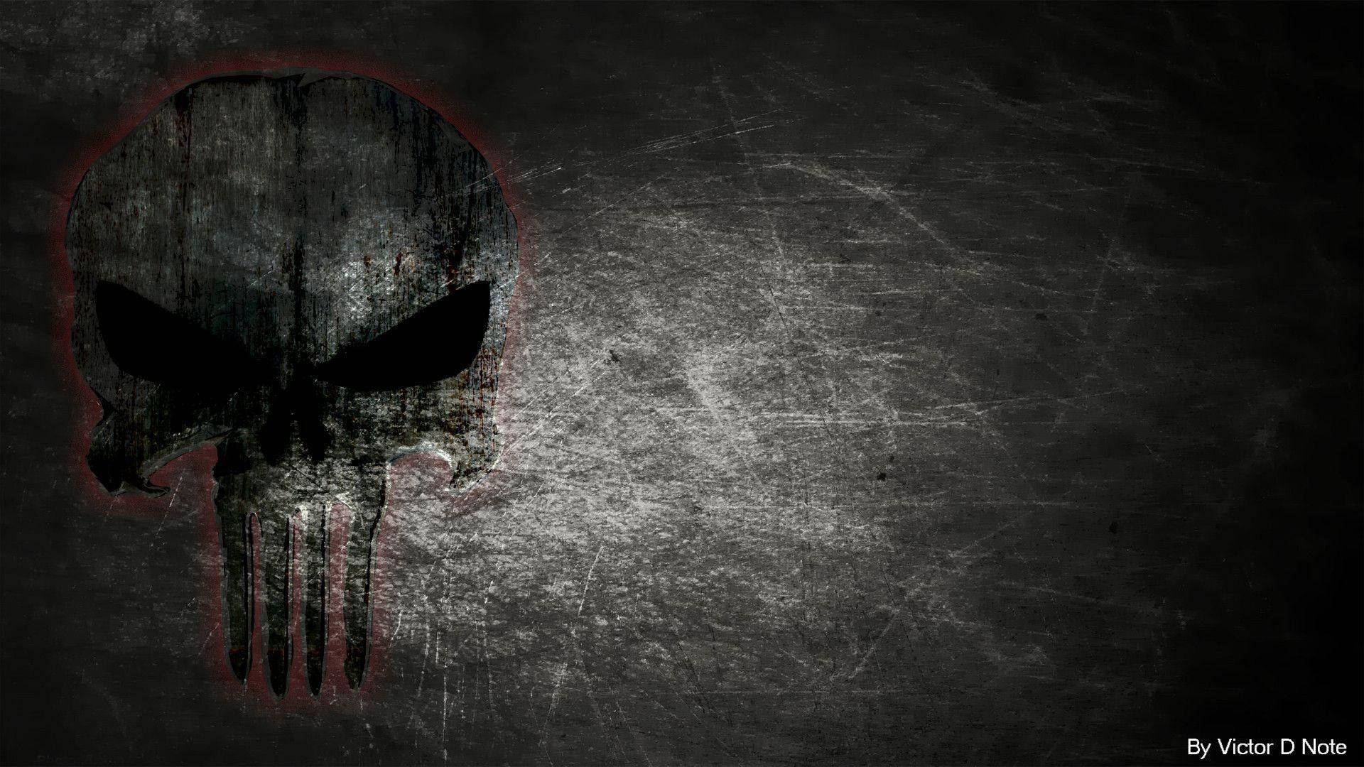 Punisher Logo 桌布 壁紙 — 一個經風化的懲罰者頭骨標誌，帶有紅色輪廓，在刮花的深灰色牆壁上顯得格外突出。