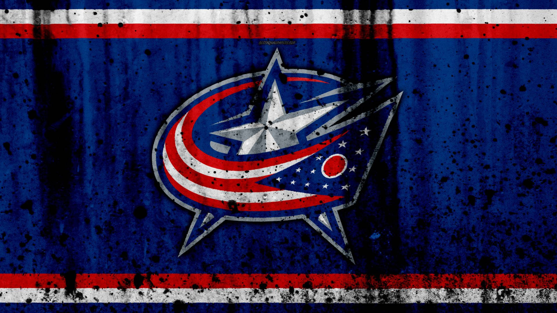 Columbus Blue Jackets 桌布 壁紙 — 一個經風化的藍色背景，帶有紅色和白色條紋，展示了一個破舊的哥倫布藍夾克標誌，帶有星星和星爆設計。