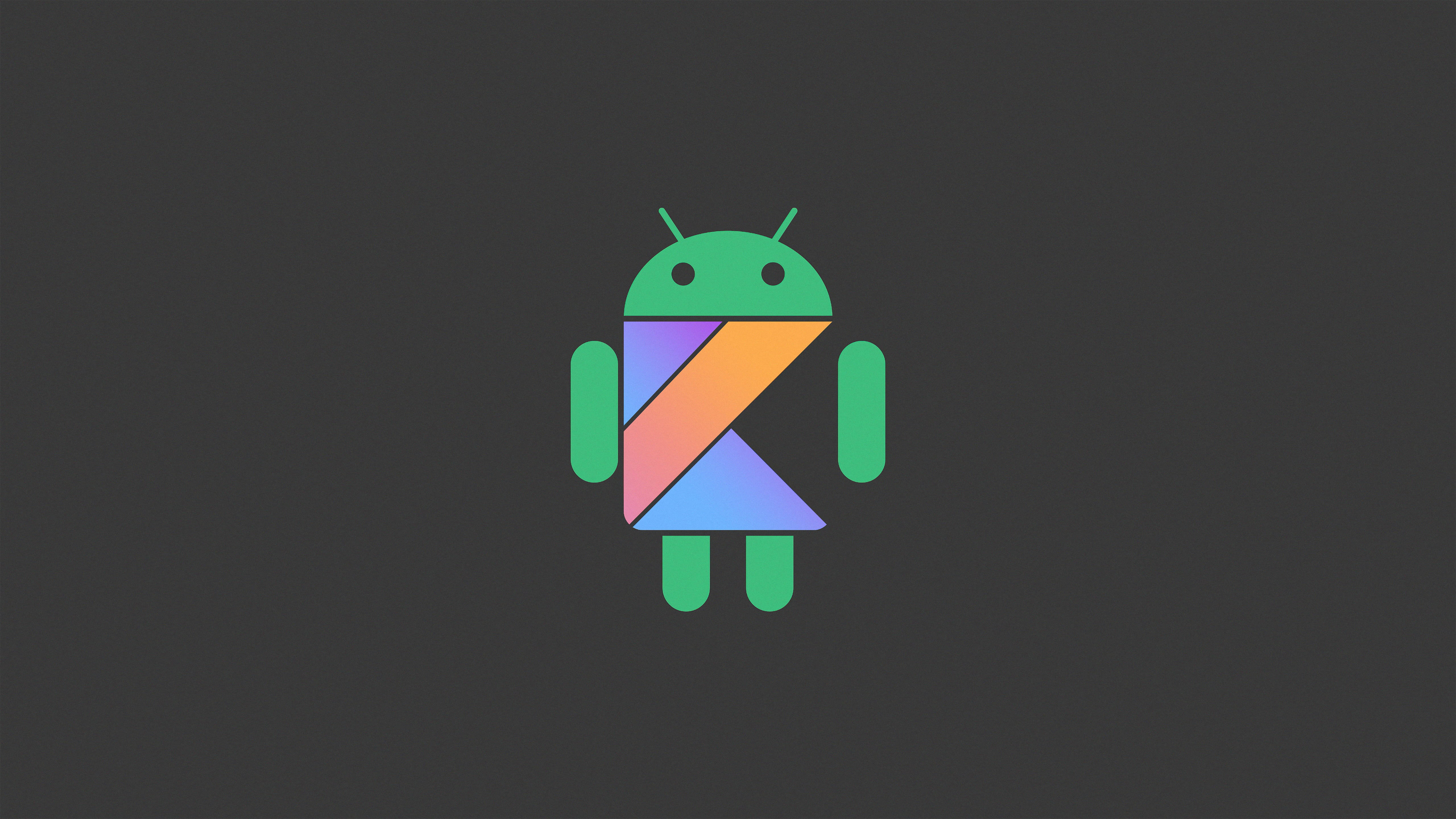 Android Desktop 桌布 壁紙 — 一個綠色Android機器人圖標，帶有彩色幾何形狀的軀幹，居中在深灰色背景上。