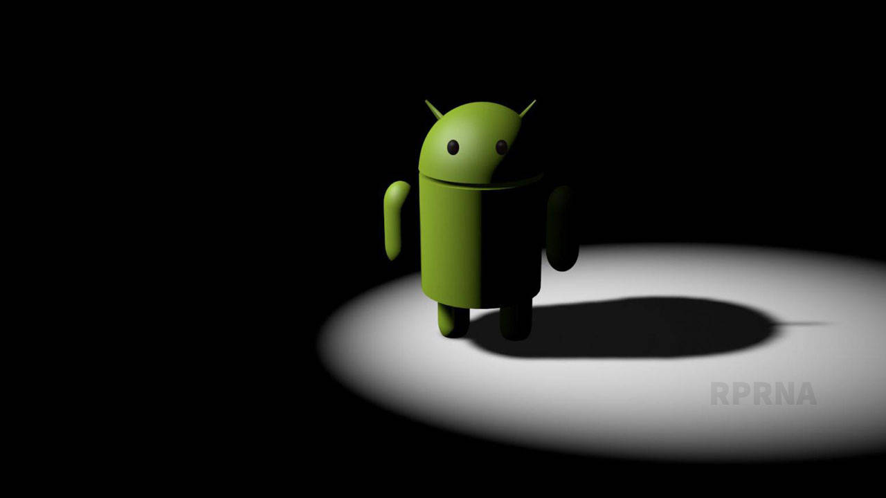 綠色Android機器人在黑暗背景中被聚光燈照亮。